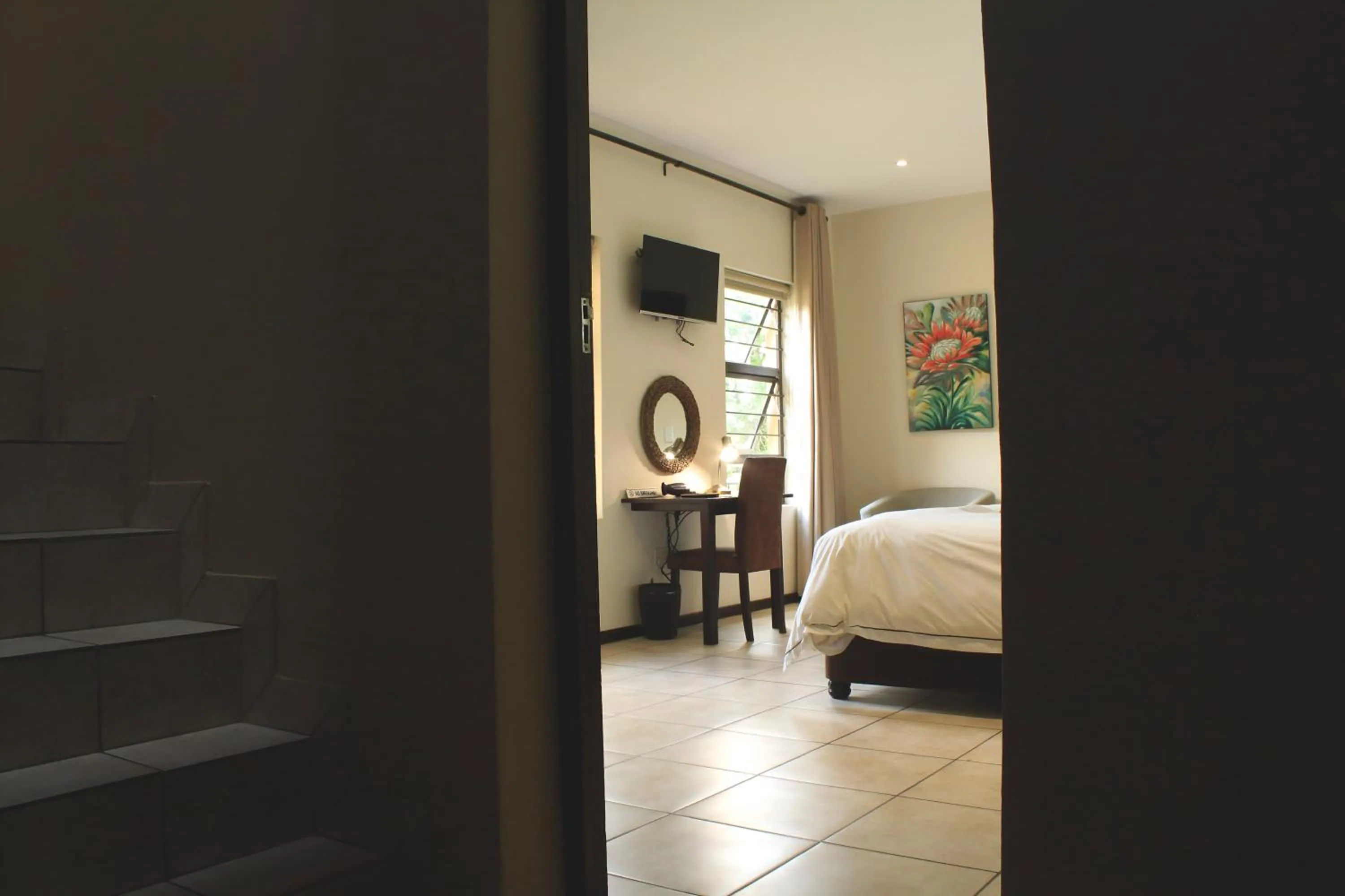 Garden view, Bed in Blue Hills Lodge