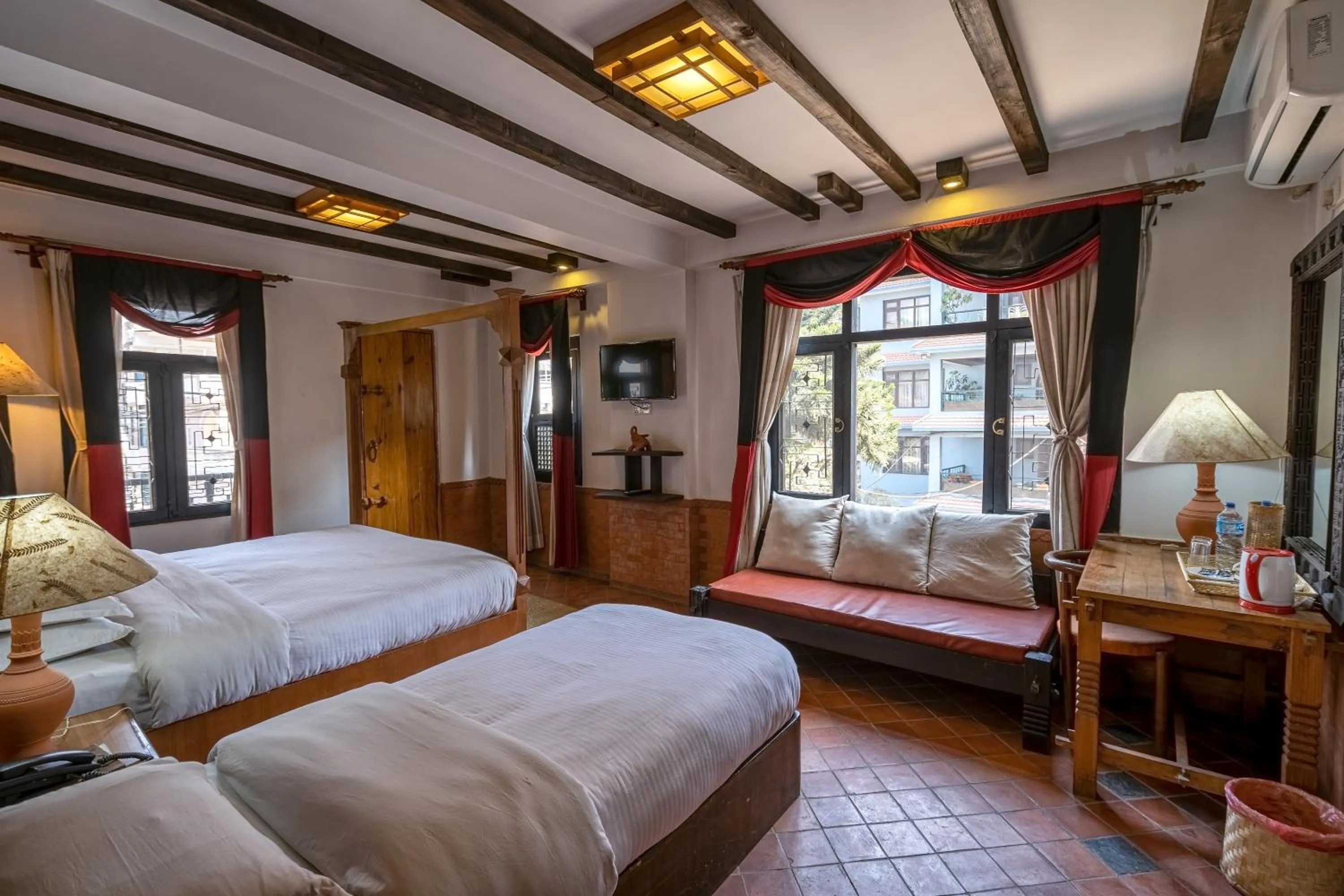 TV and multimedia, Bed in Hotel Ganesh Himal