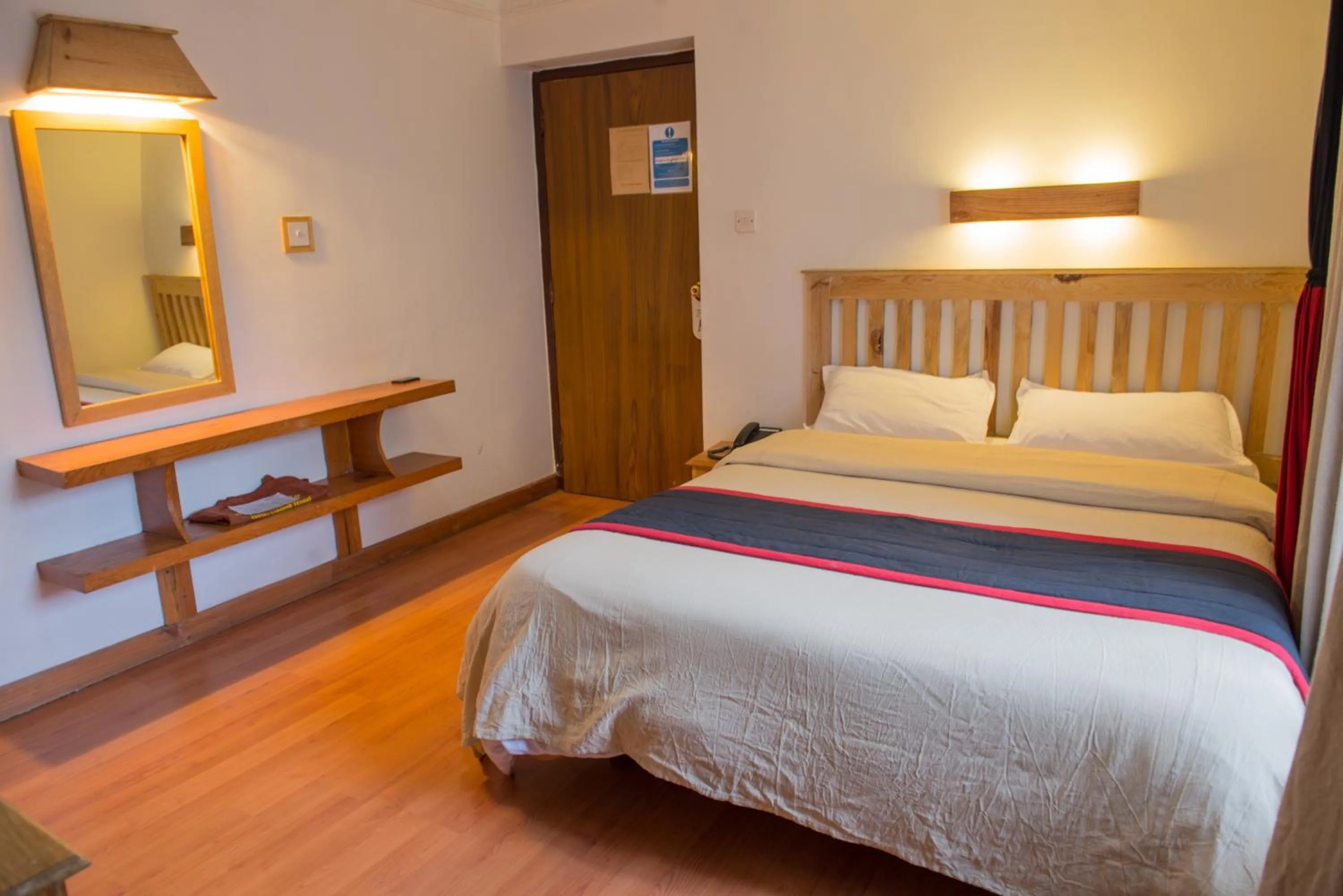 Bed in Hotel Ganesh Himal