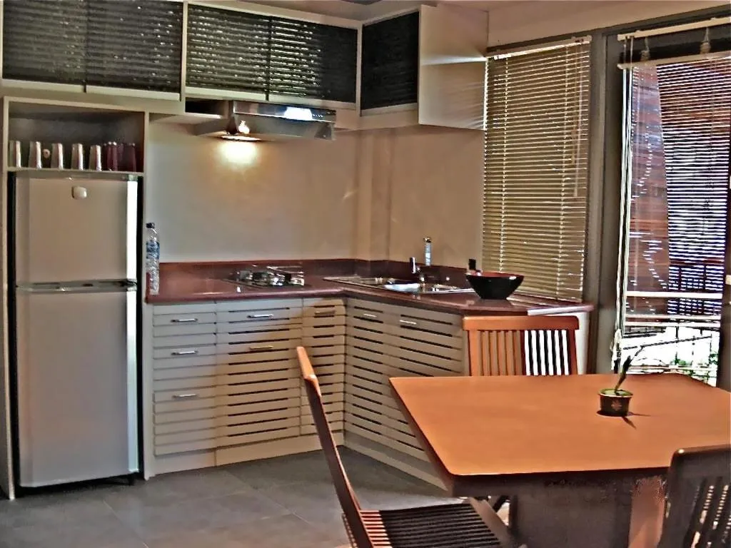 Kitchen or kitchenette in Sejuk Suites