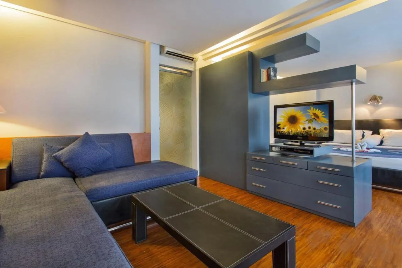 Communal lounge/ TV room in Sejuk Suites