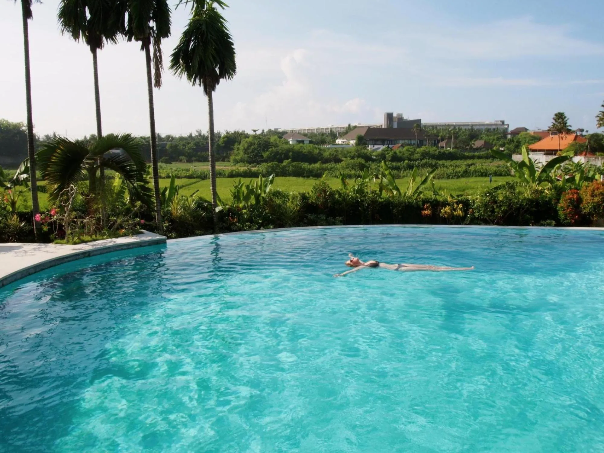 Swimming pool in Nipuri Resort and Villas Seminyak by Kamara