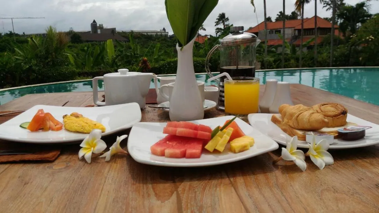 Continental breakfast in Nipuri Resort and Villas Seminyak by Kamara