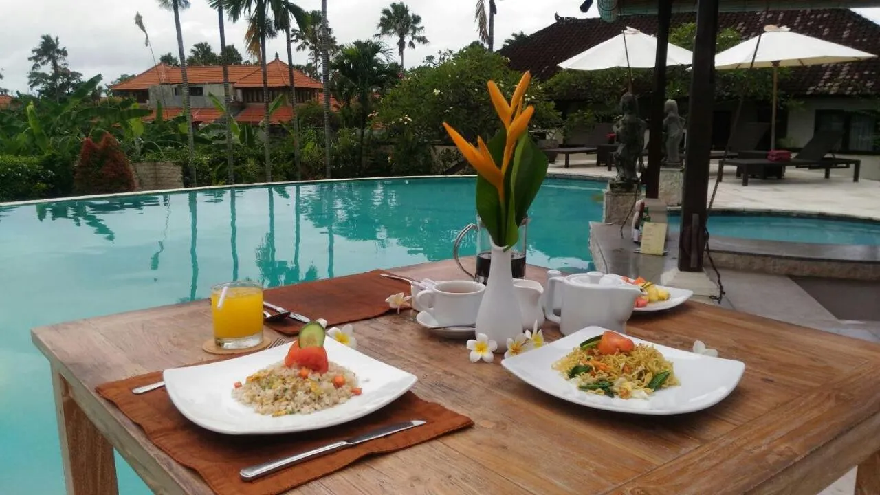 Asian breakfast in Nipuri Resort and Villas Seminyak by Kamara