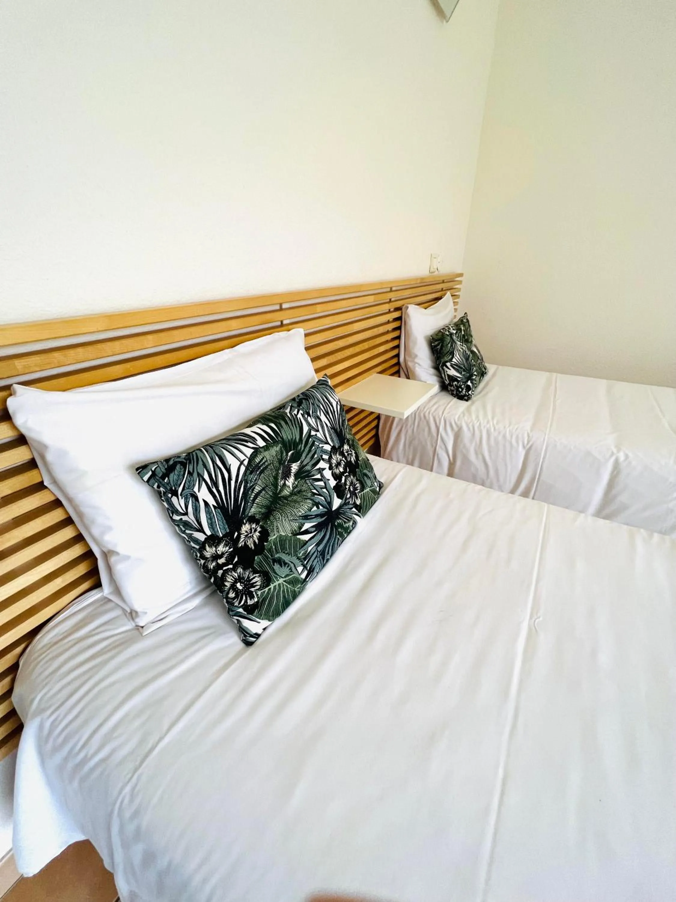 Bed in Hôtel Rose des Vents