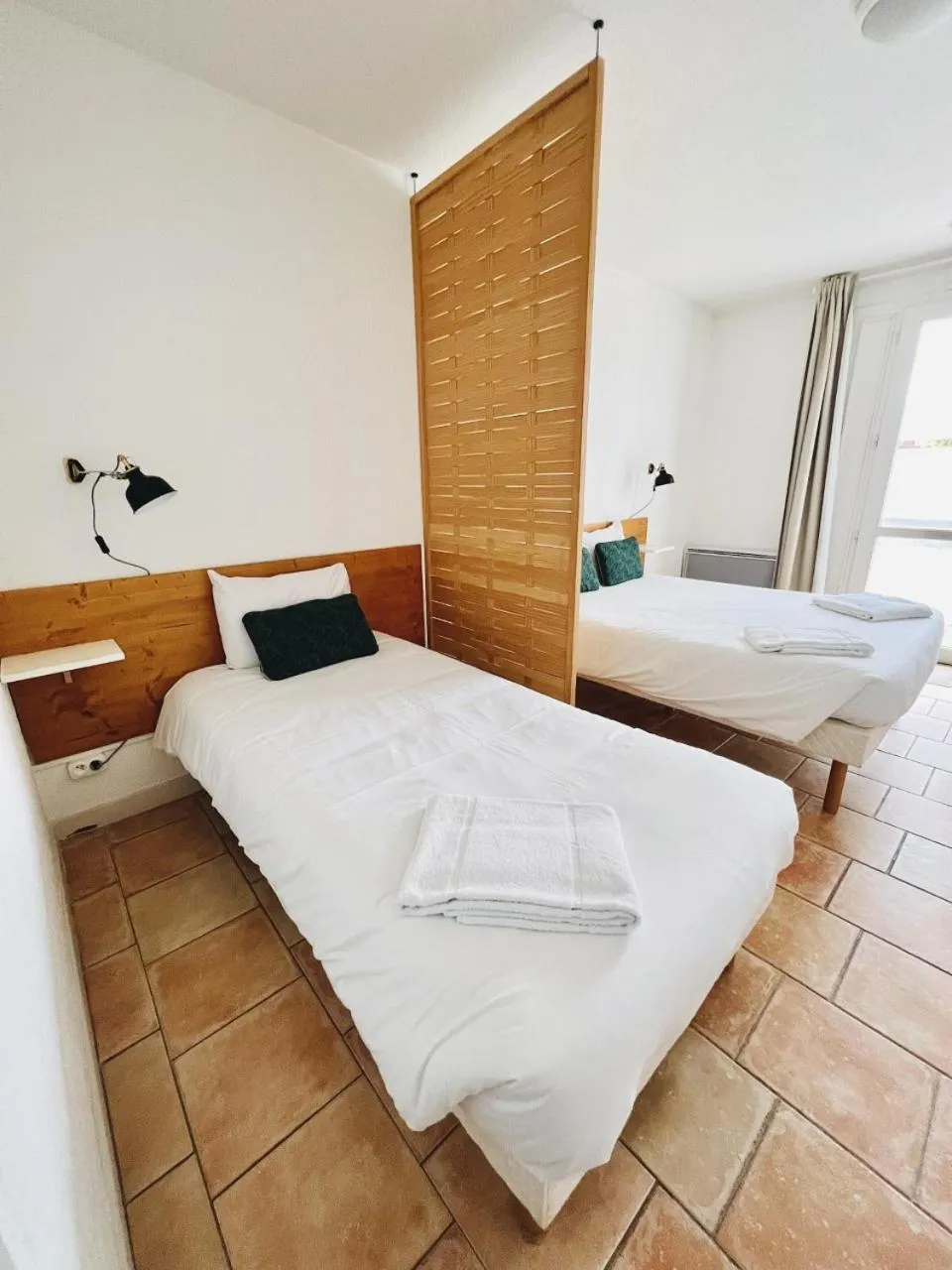 Bed in Hôtel Rose des Vents