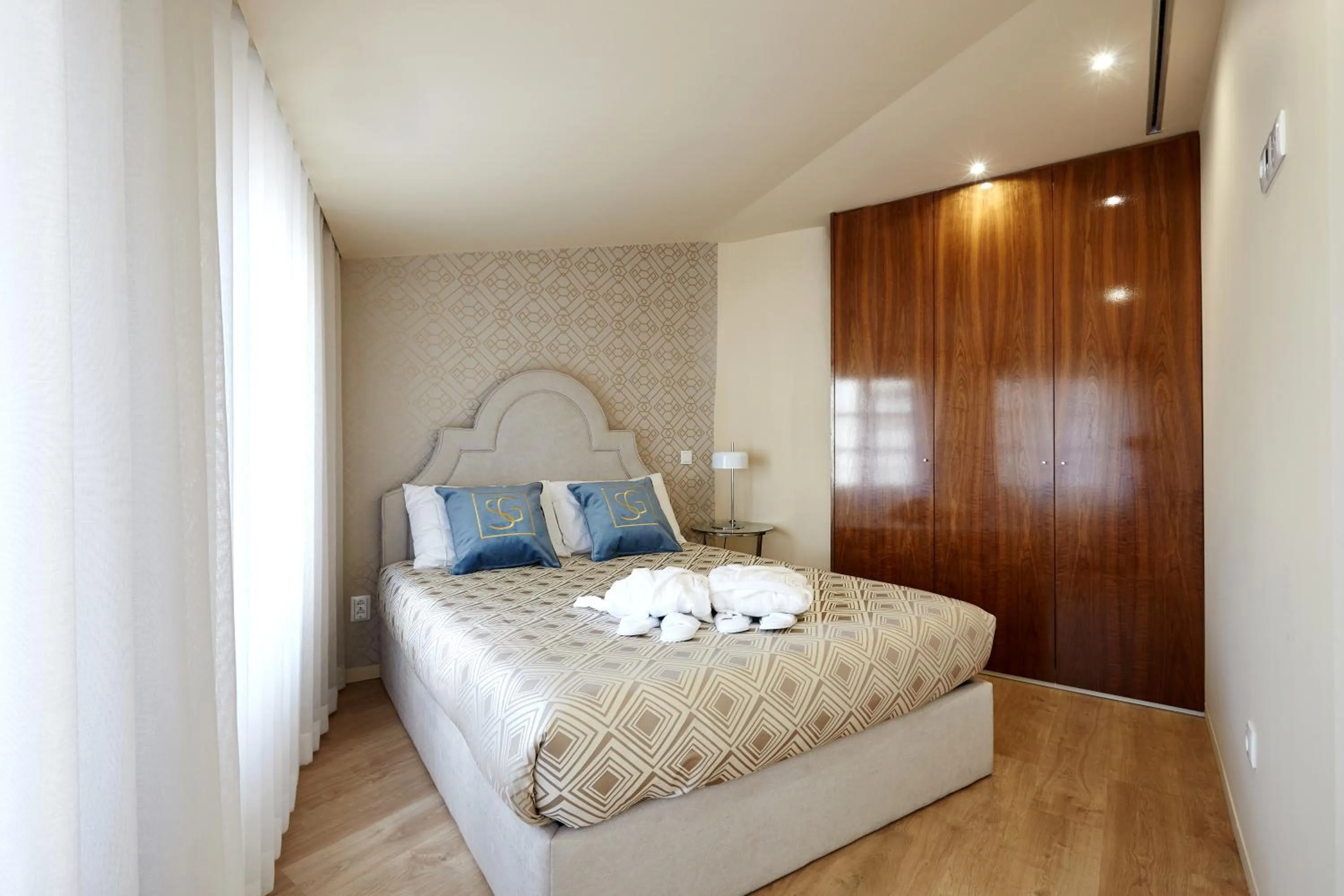Photo of the whole room, Bed in Signature Apartments Os Terceiros