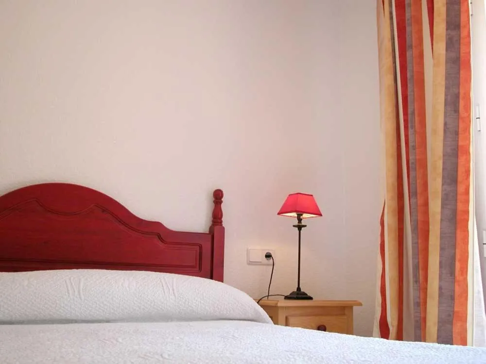 Photo of the whole room, Bed in Apartamentos Oasis de las Palmeras