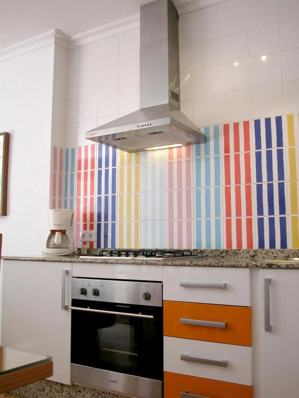 Kitchen or kitchenette in Apartamentos Oasis de las Palmeras