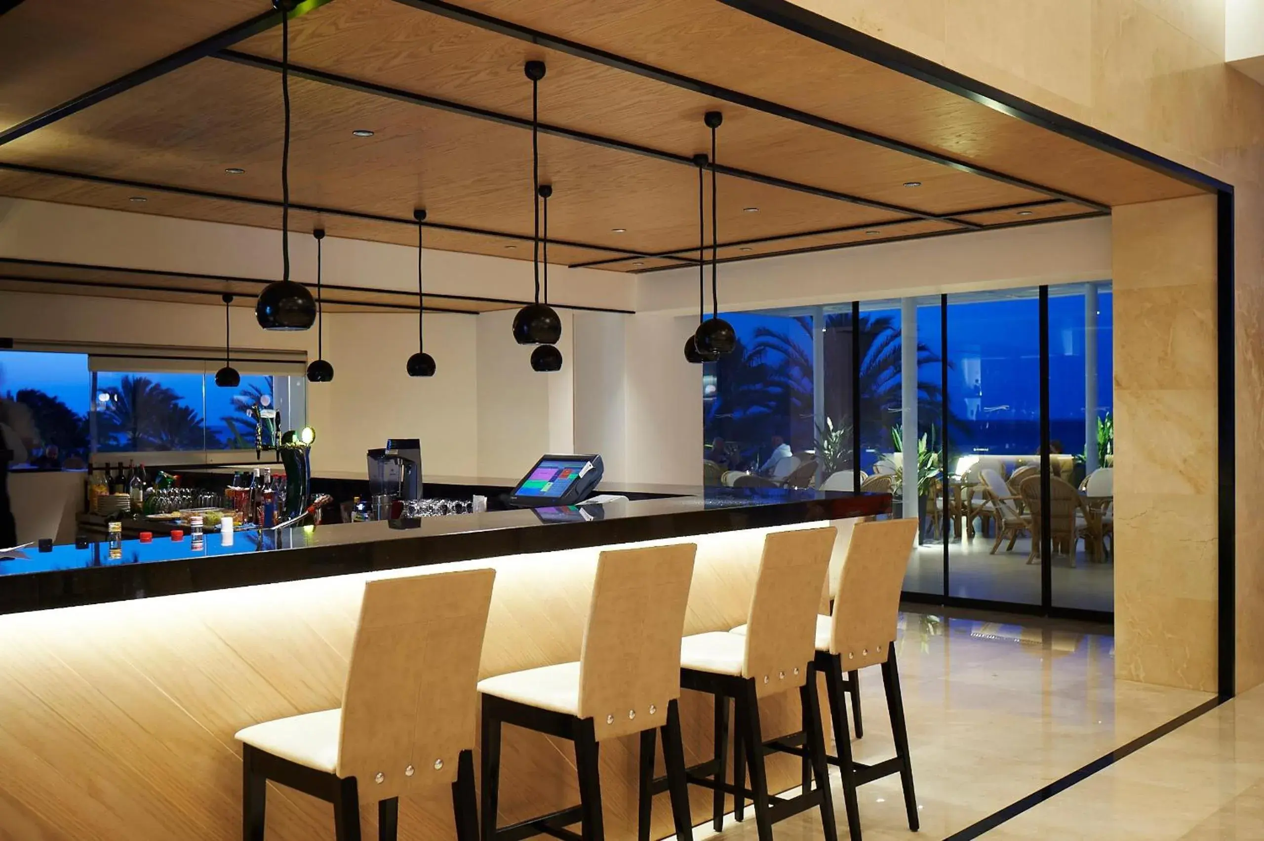 Lounge or bar in Sunrise Beach Hotel Lounge or bar in Sunrise Beach Hotel