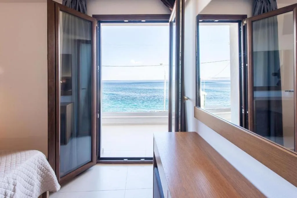 Balcony/Terrace, Bed in Dimitra Hotel & Apartments by Omilos Hotels