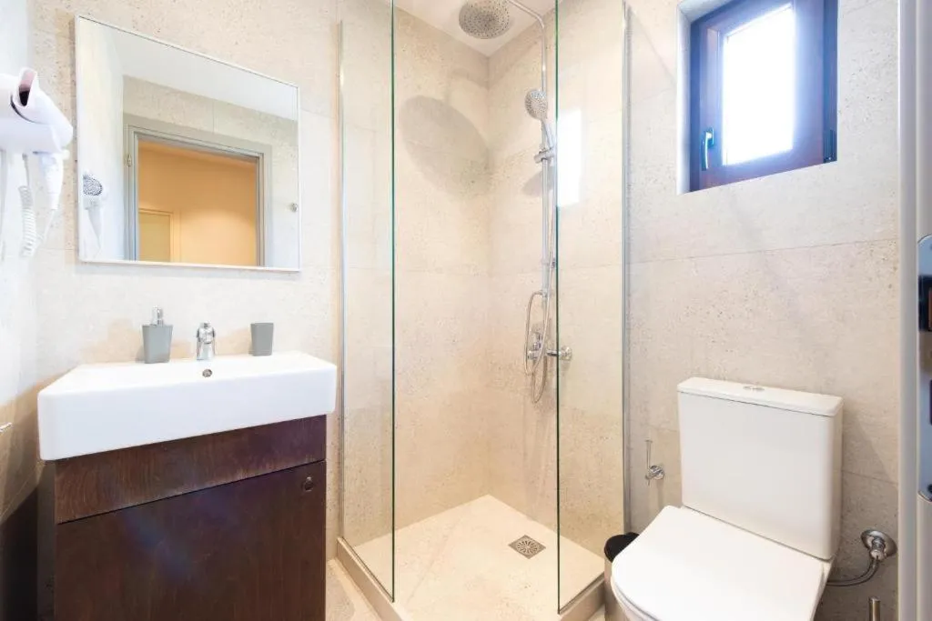 Shower in Dimitra Hotel & Apartments by Omilos Hotels