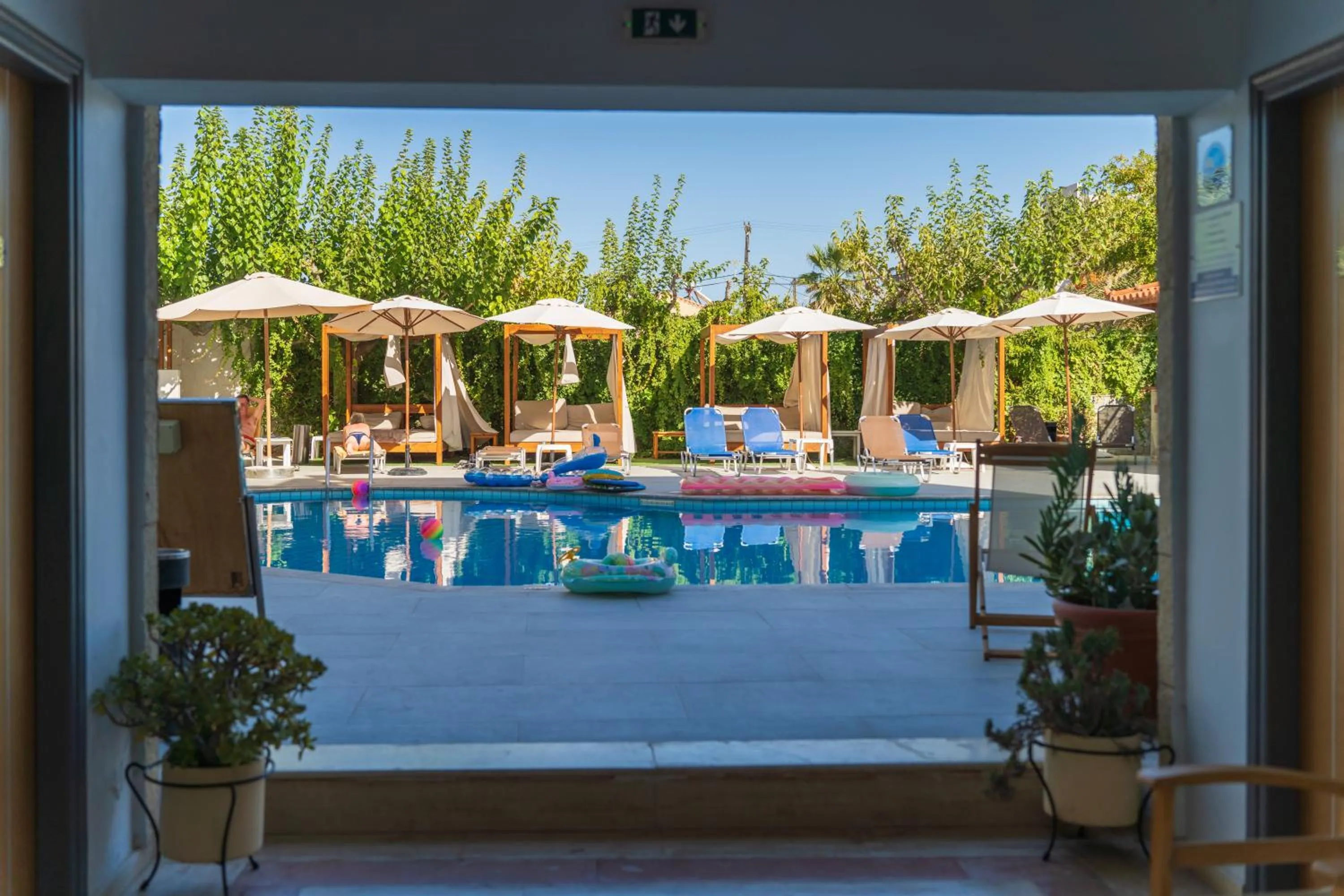 Swimming pool in Dimitra Hotel & Apartments by Omilos Hotels