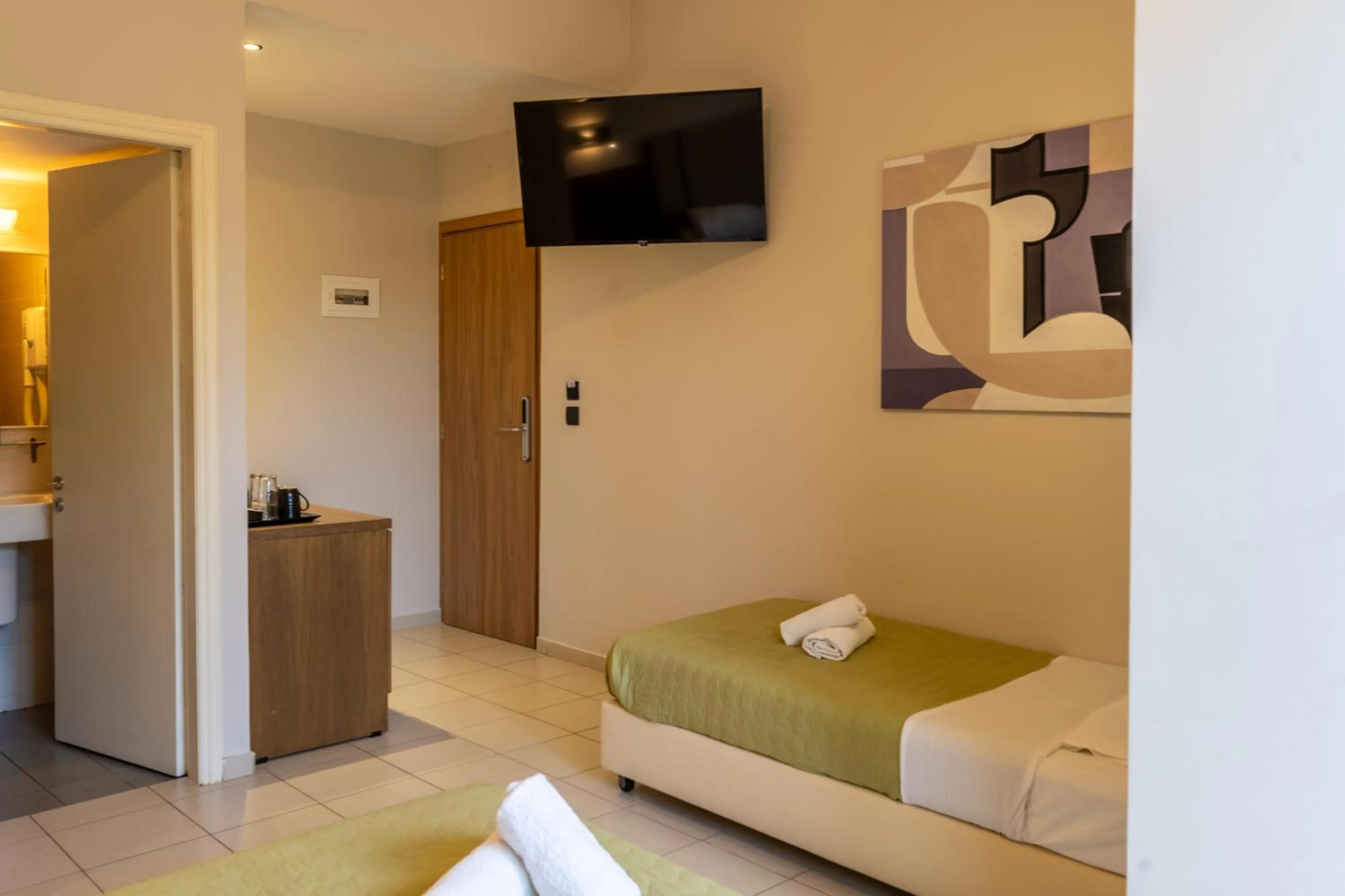 Bedroom, Bed in Dimitra Hotel & Apartments by Omilos Hotels