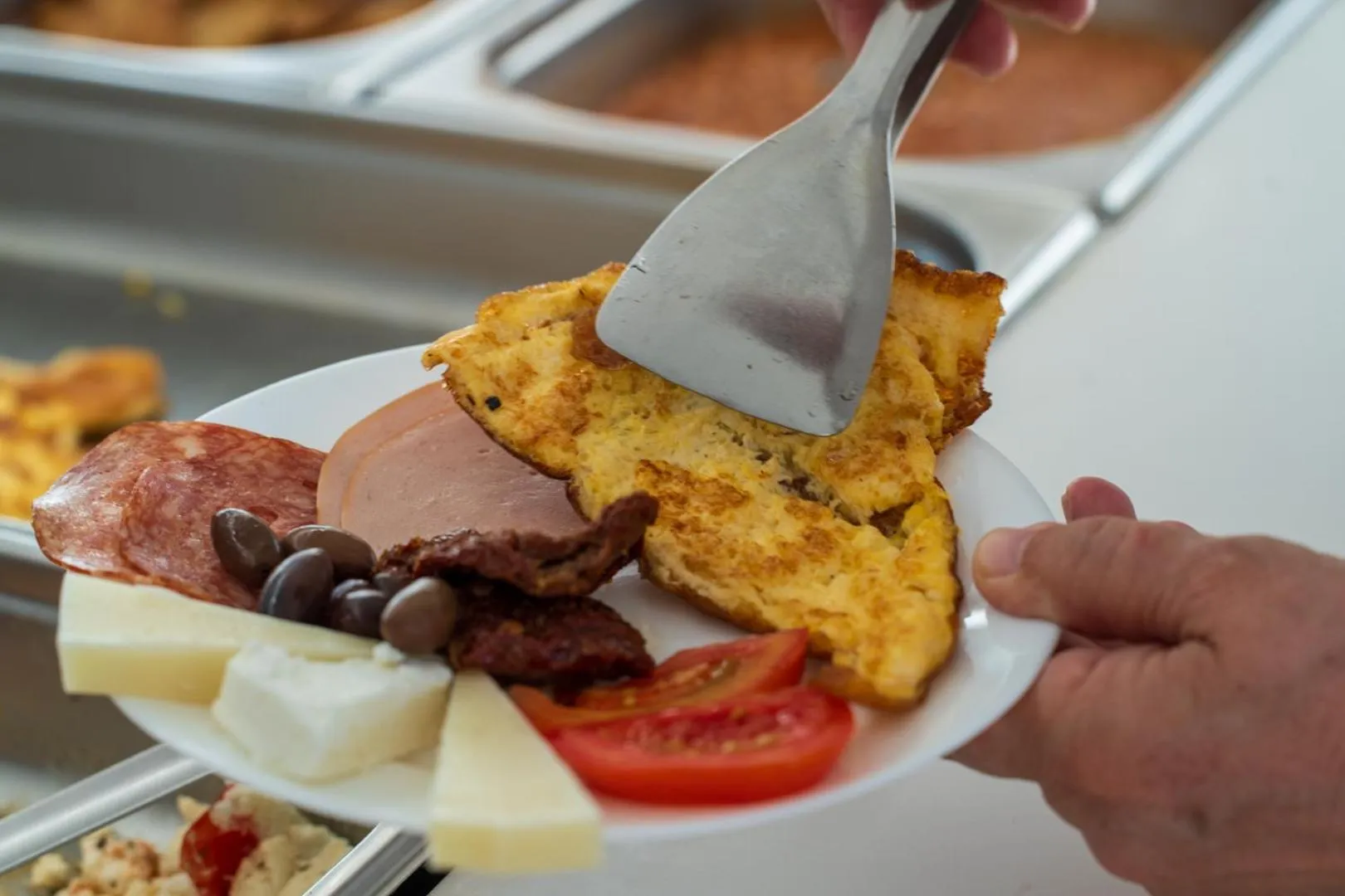 Buffet breakfast in Dimitra Hotel & Apartments by Omilos Hotels