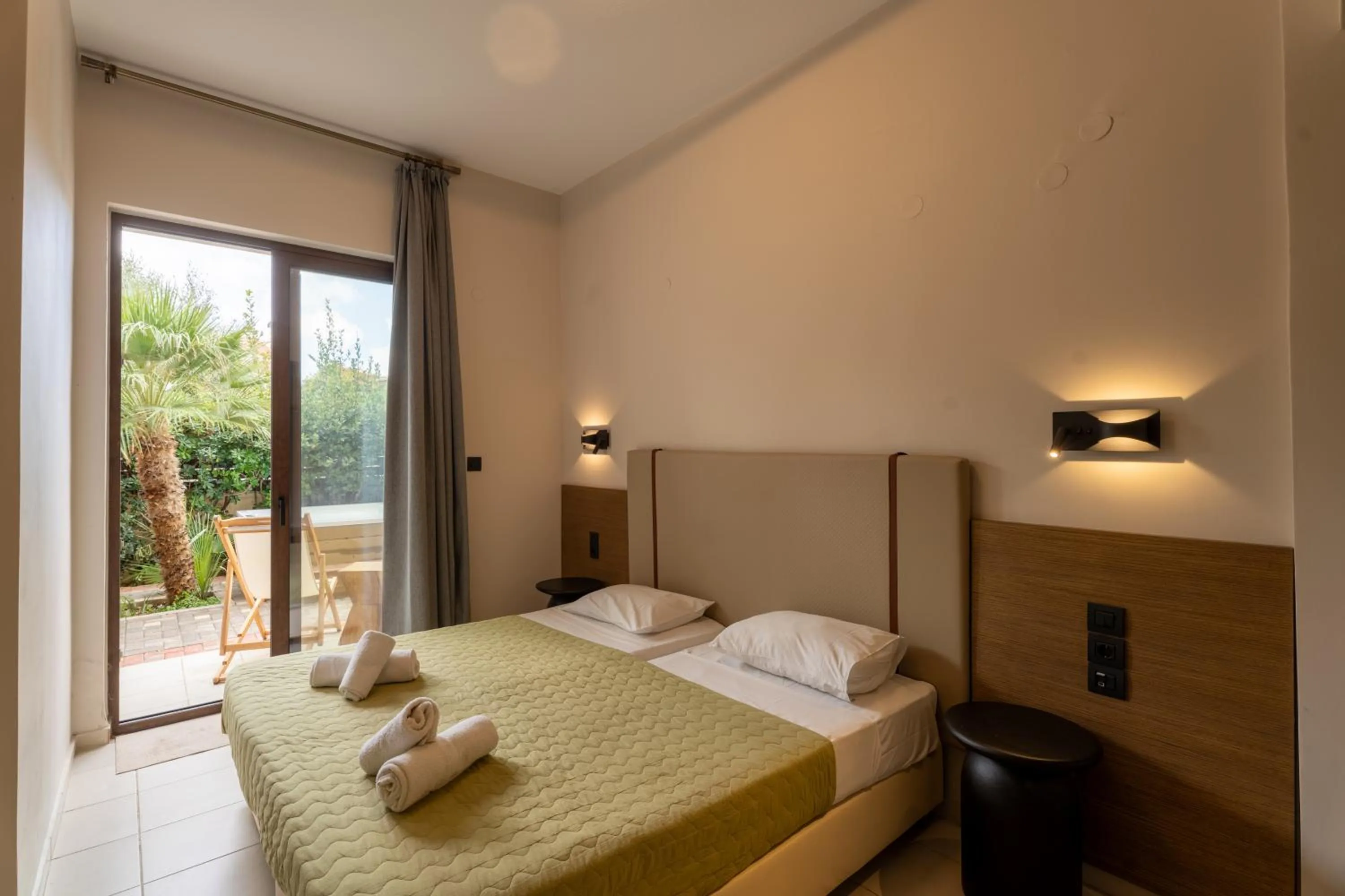 Bed in Dimitra Hotel & Apartments by Omilos Hotels