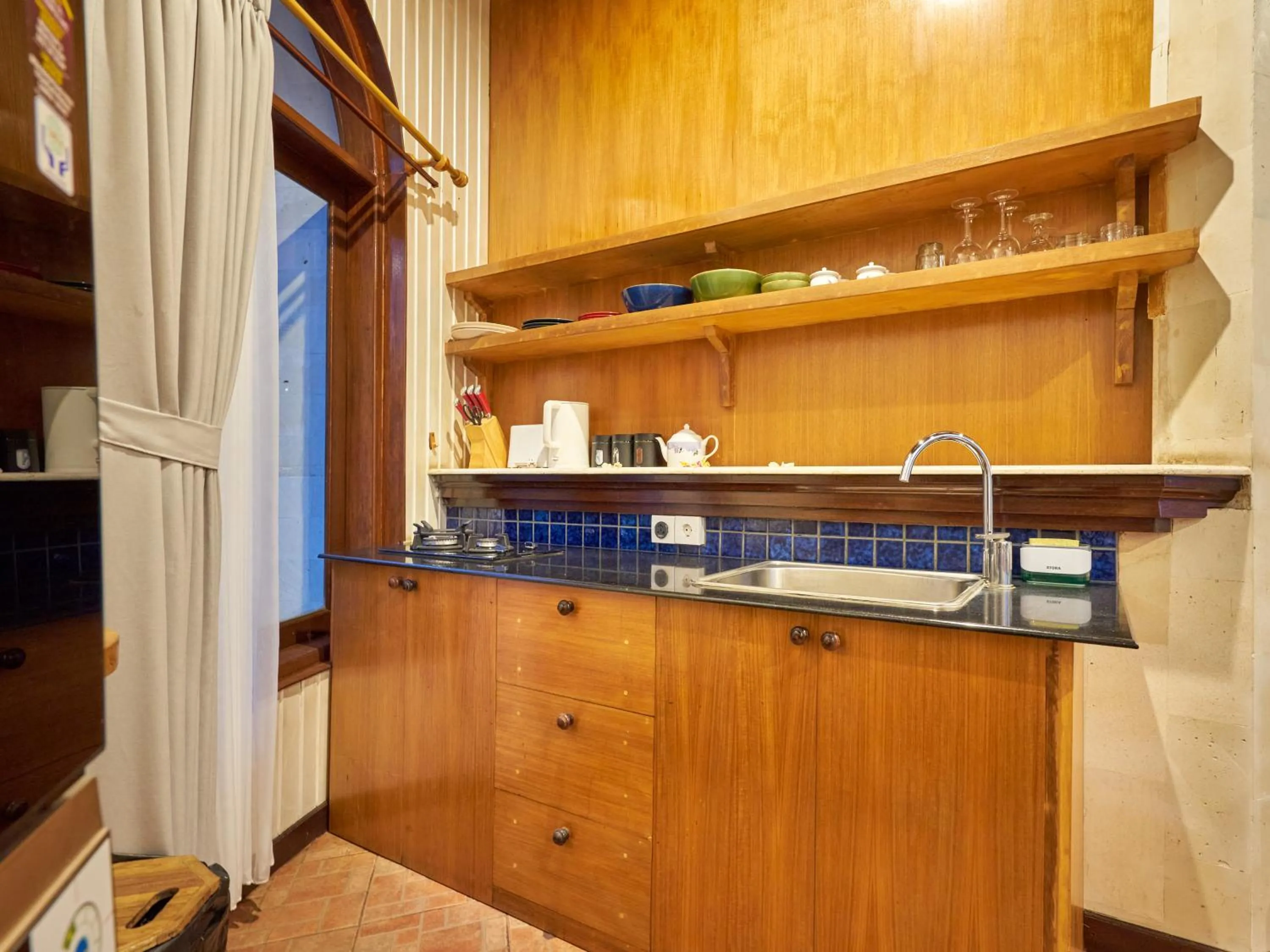 Kitchen or kitchenette in Onlyou Villas