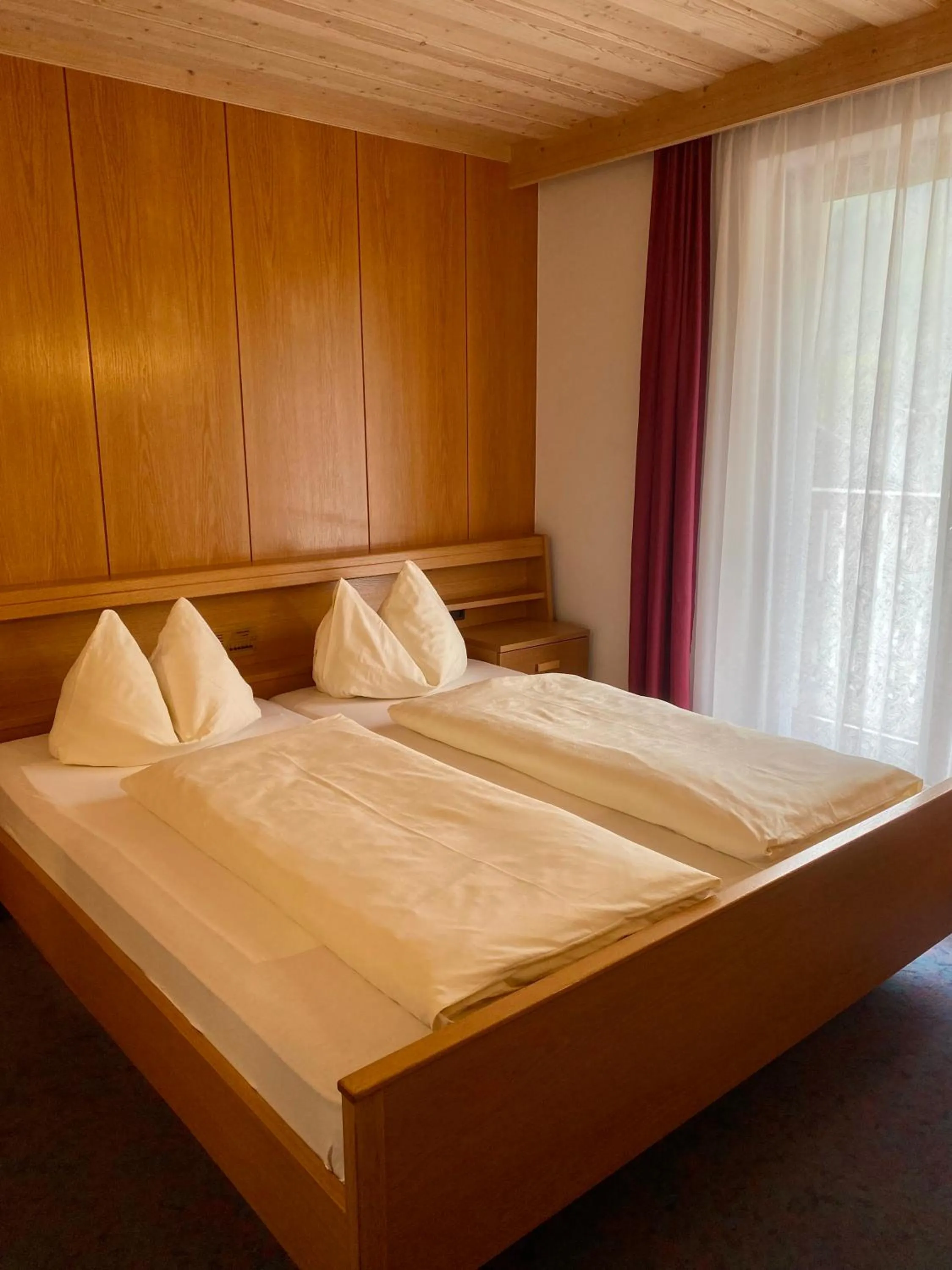 Bed in Naturhotel Haller