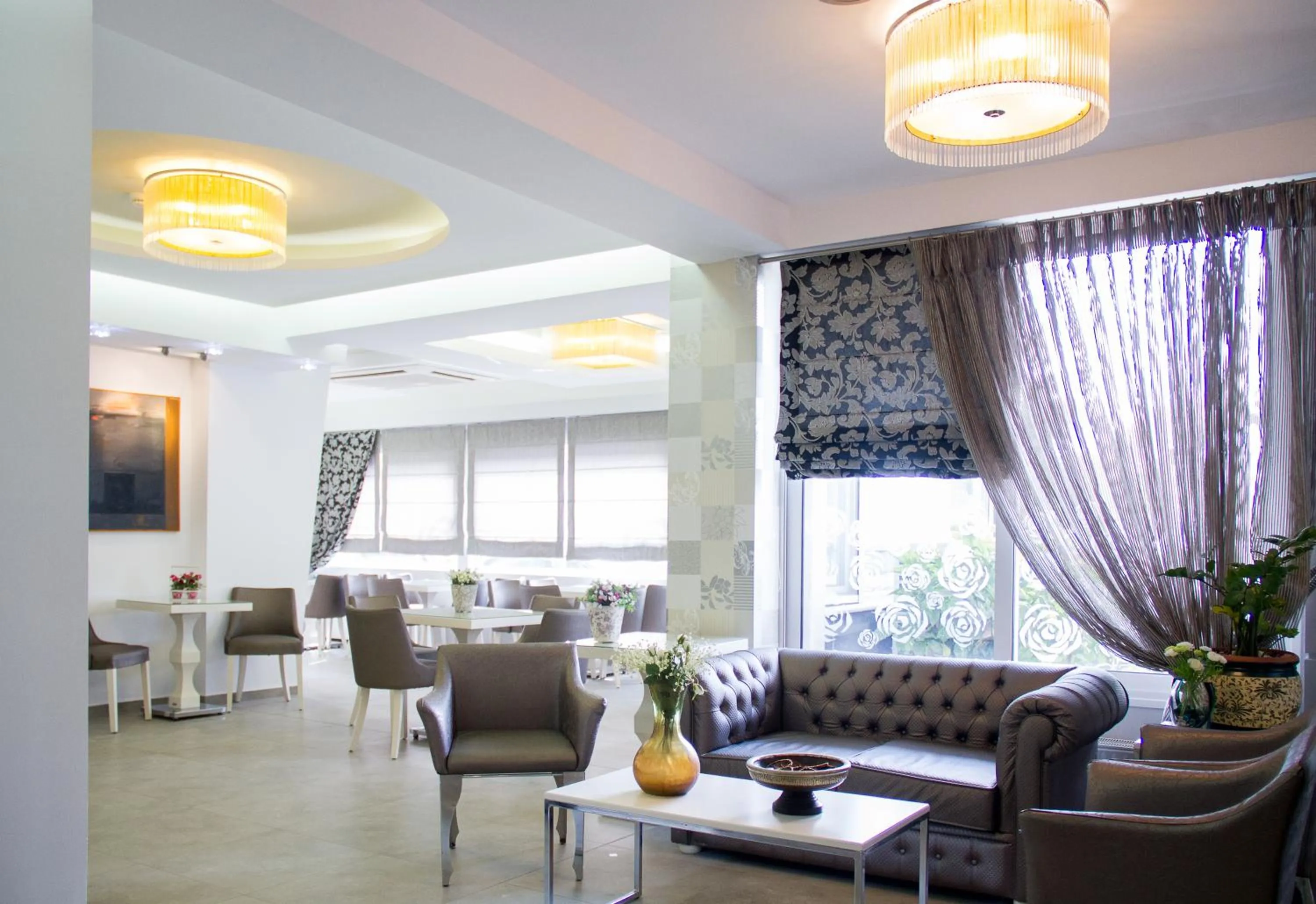 Communal lounge/ TV room in Hotel Rodon