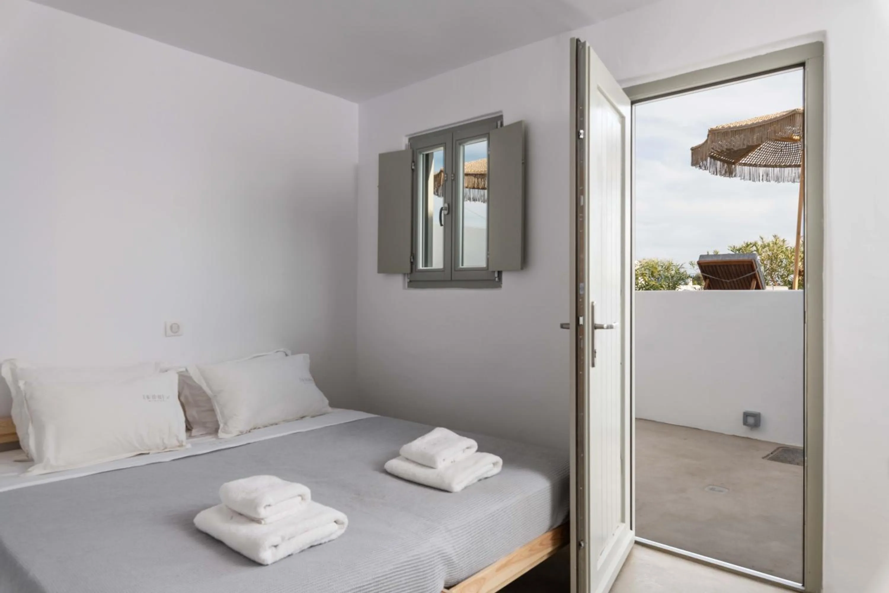 Bed in Trinity Mykonos - Beachfront Villa