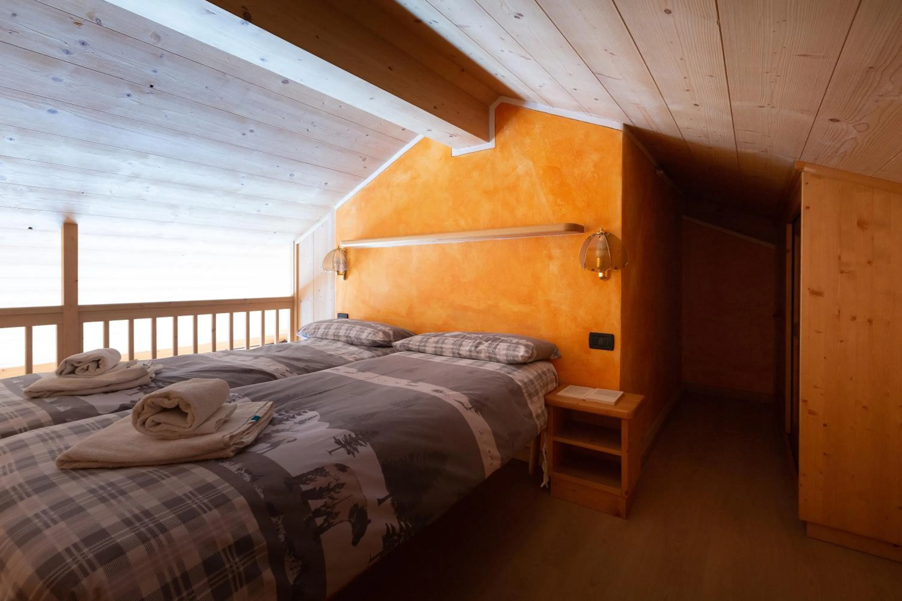 Bed in La Grolla Rooms & Apartments