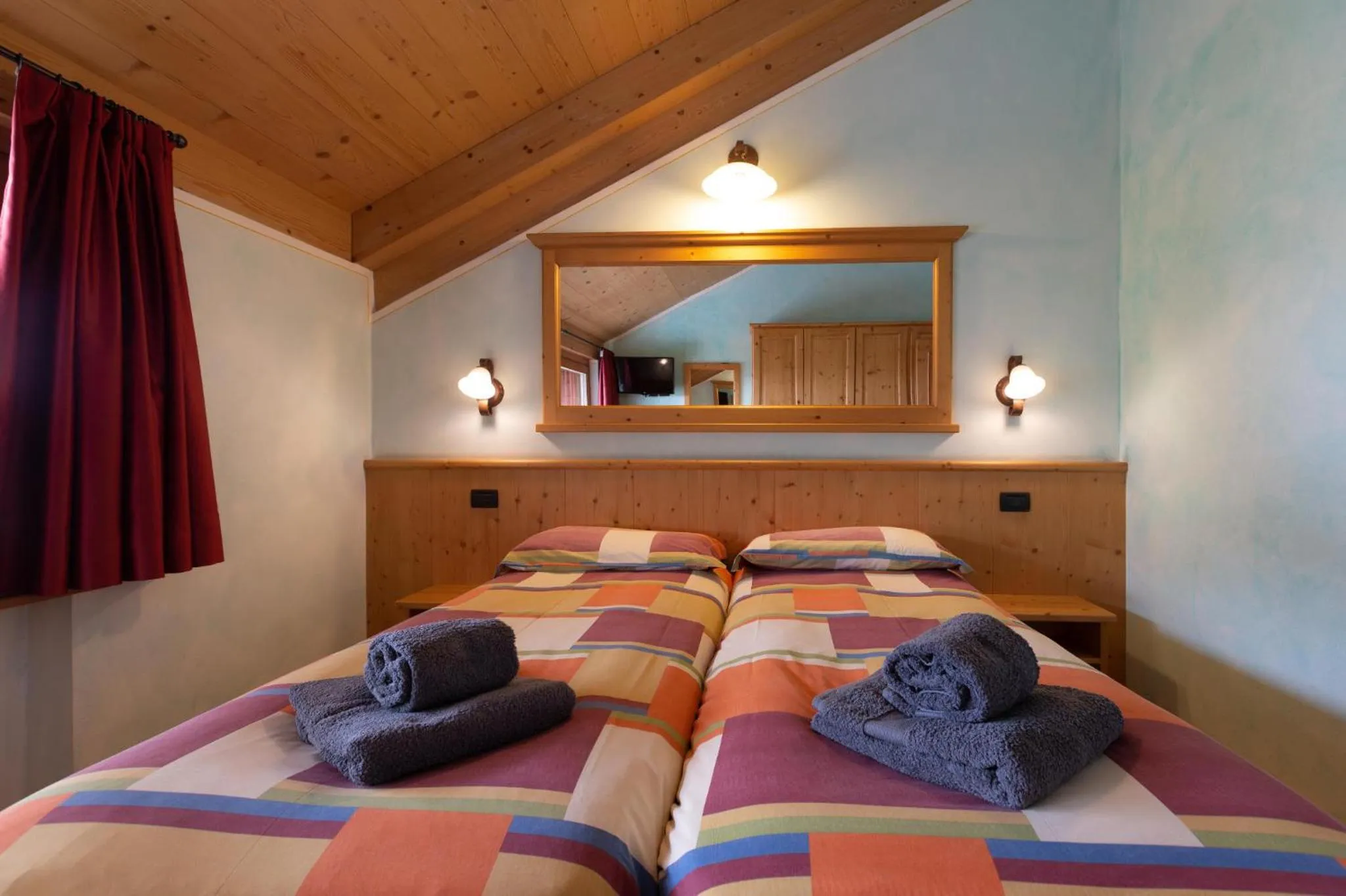 Bed in La Grolla Rooms & Apartments