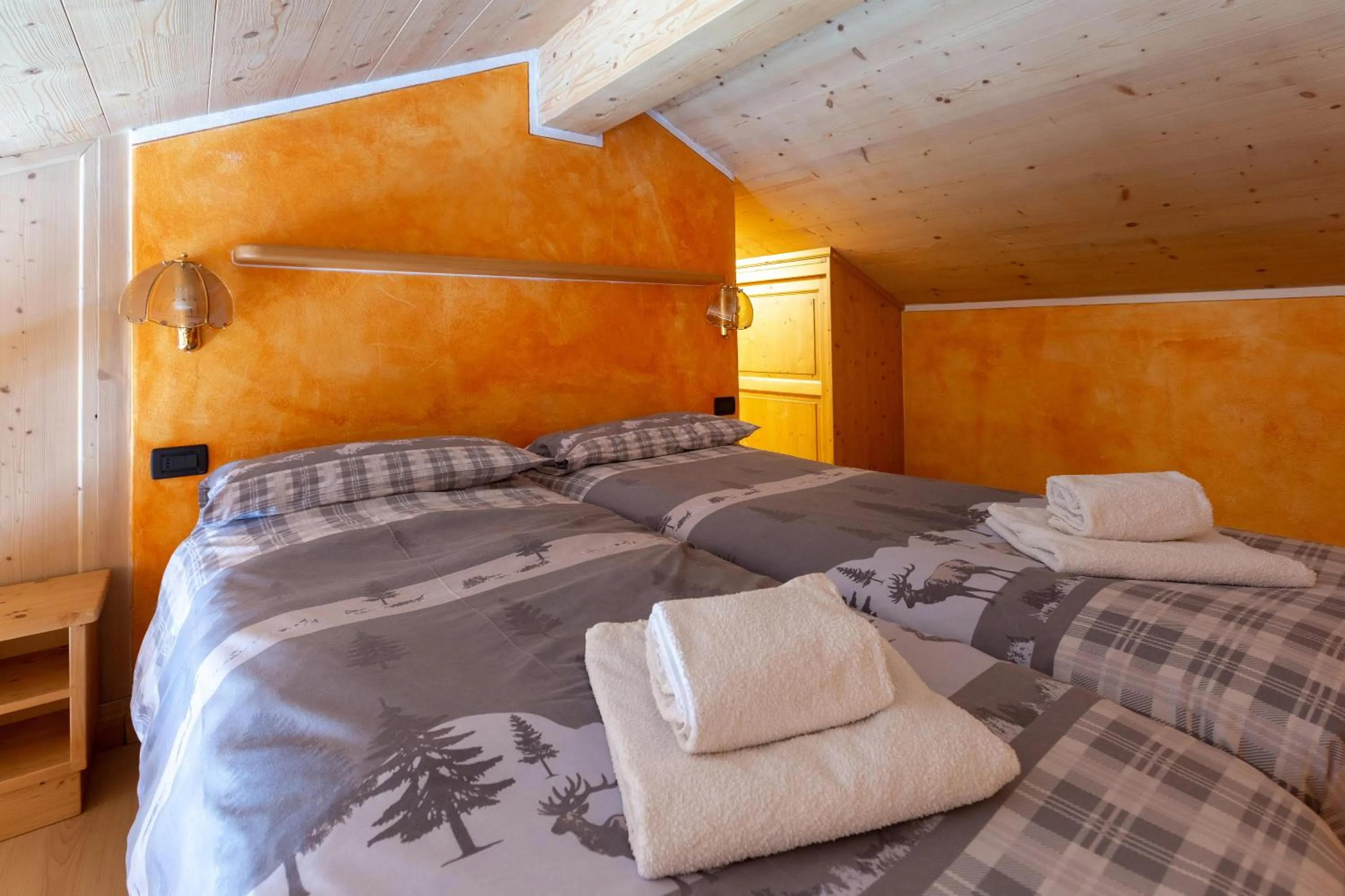 Bed in La Grolla Rooms & Apartments