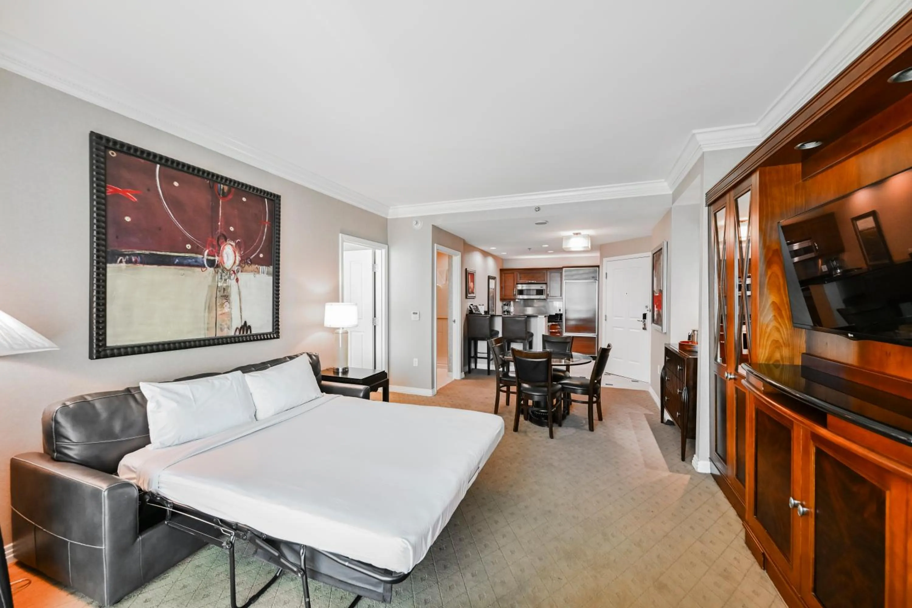 Bed in StripViewSuites at Signature