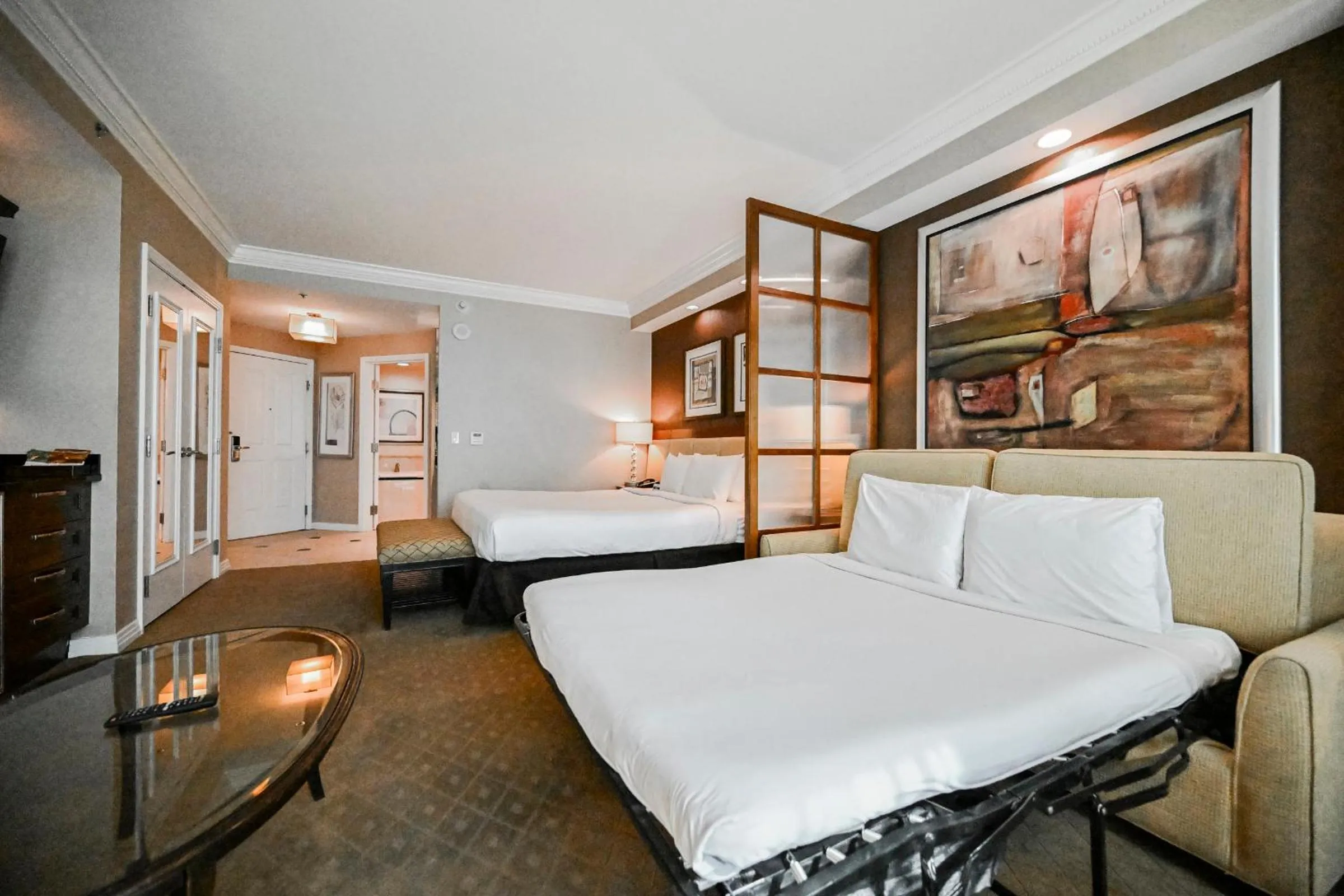 Bed in StripViewSuites at Signature