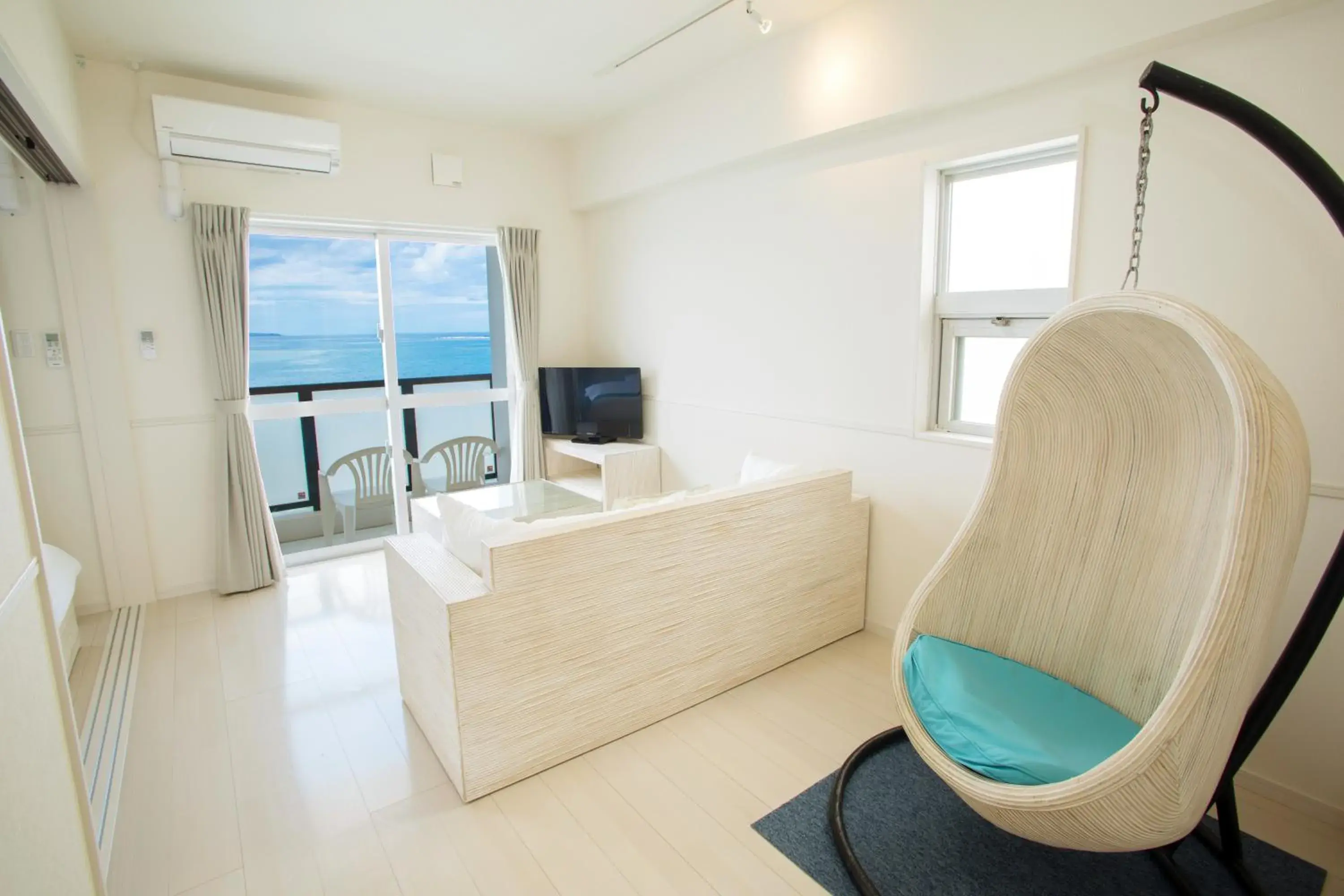 Living room, Bed in Costa Bella Condominium Resort Living room, Bed in Costa Bella Condominium Resort