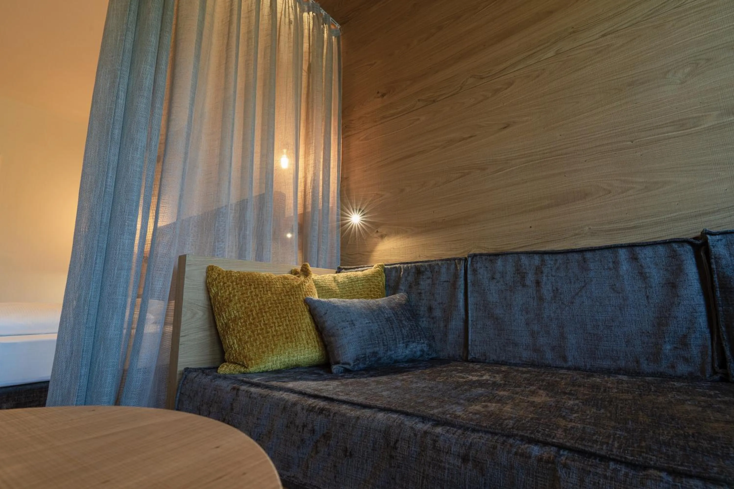 Seating area, Bed in Hotel Krondlhof