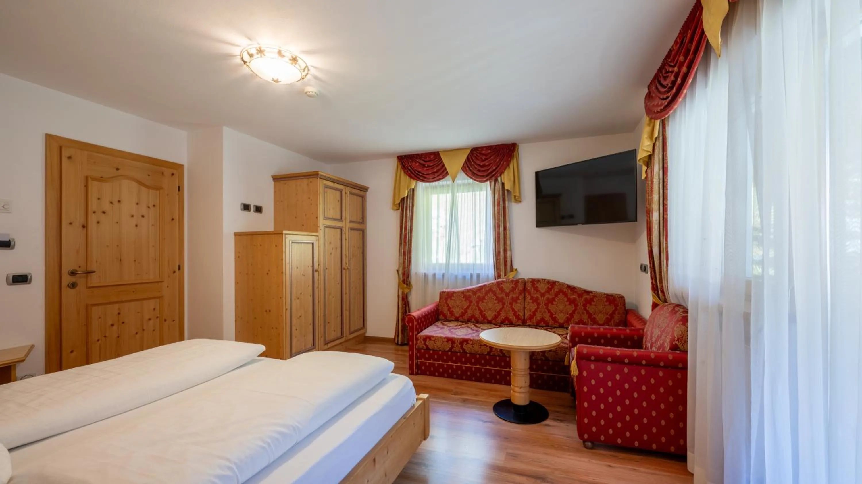Bedroom, Bed in Garni Hotel and Apartments Wildbach
