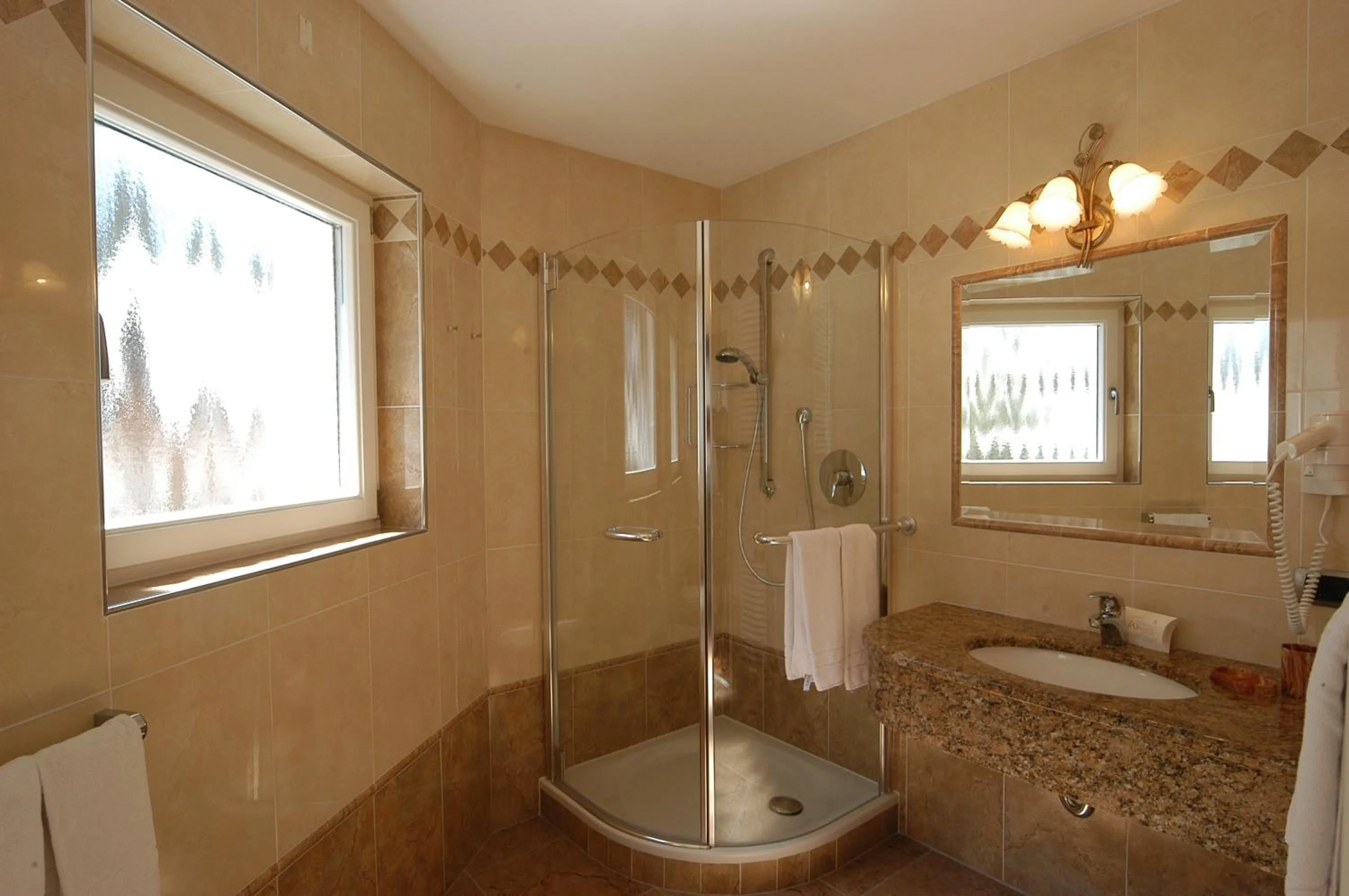 Shower in Garni Hotel and Apartments Wildbach