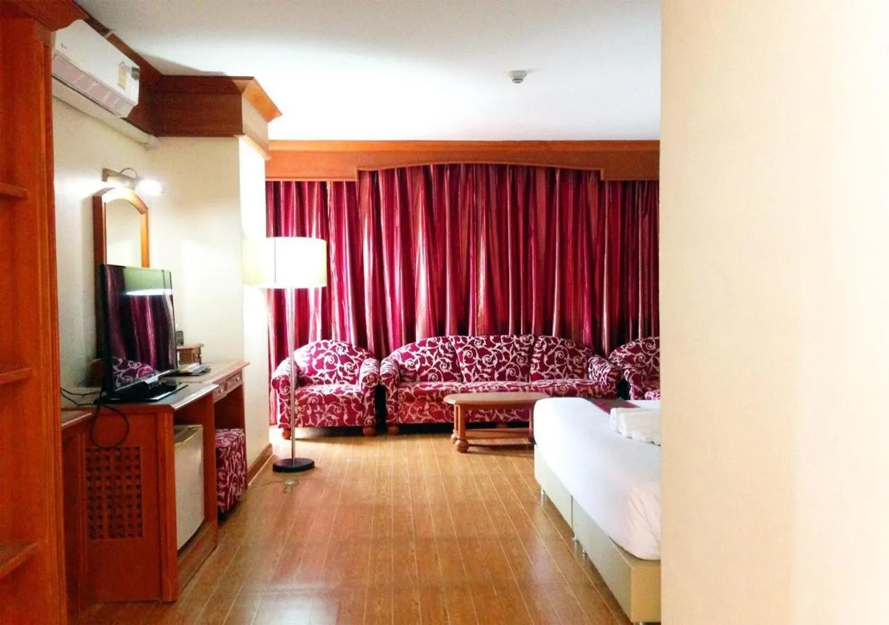 Bed in JP Emerald Hotel