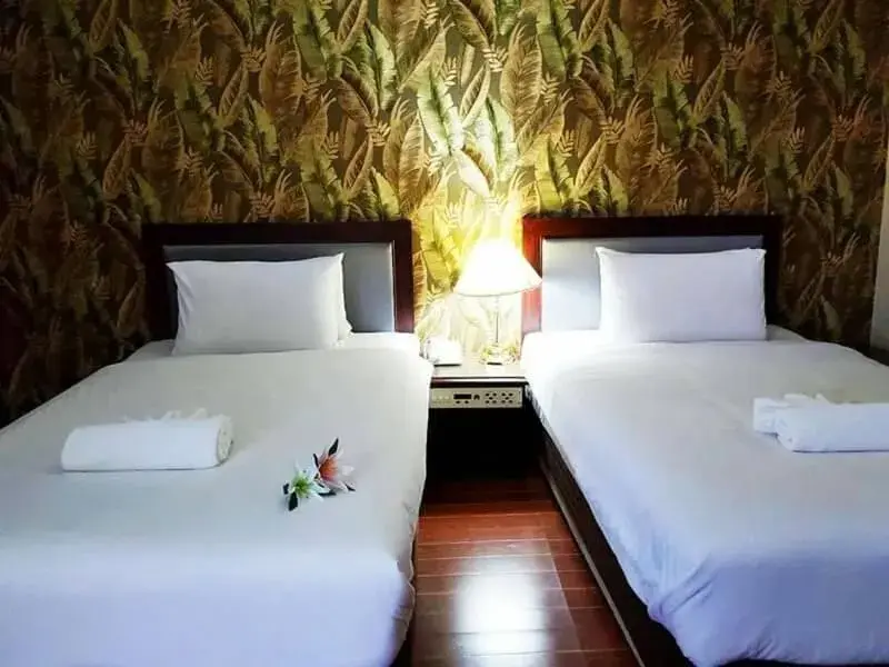 Bed in JP Emerald Hotel Bed in JP Emerald Hotel