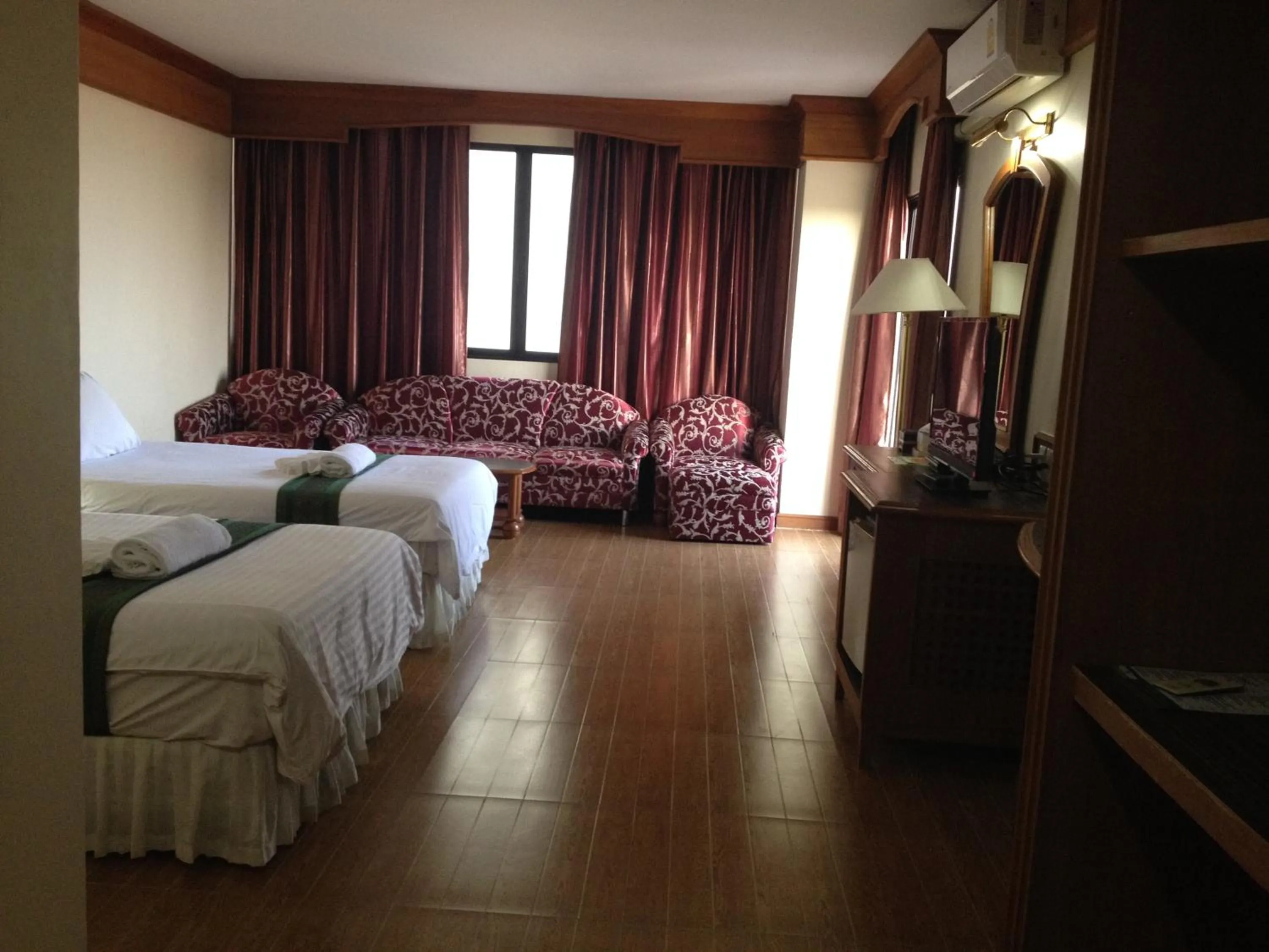 Bed in JP Emerald Hotel