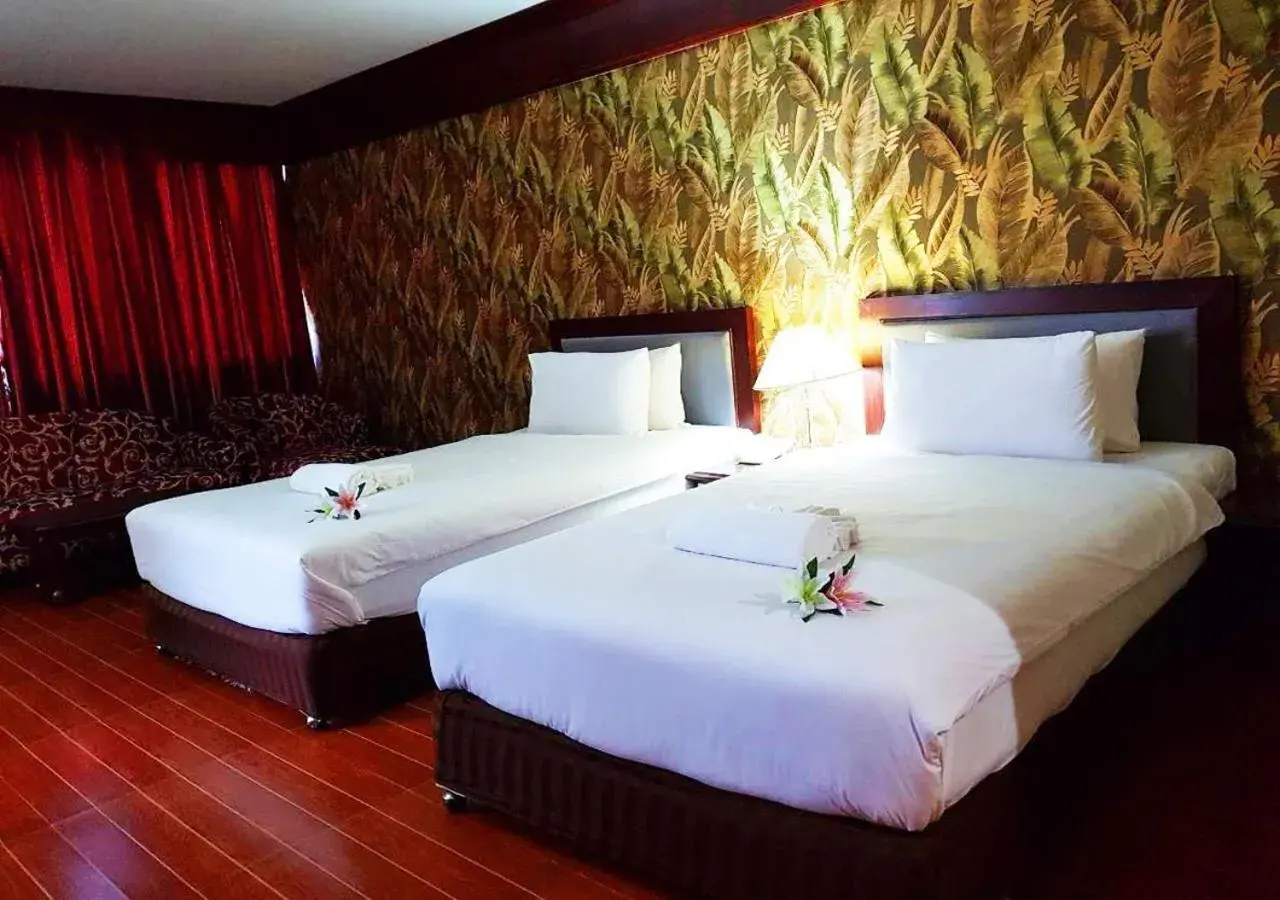 Bed in JP Emerald Hotel Bed in JP Emerald Hotel