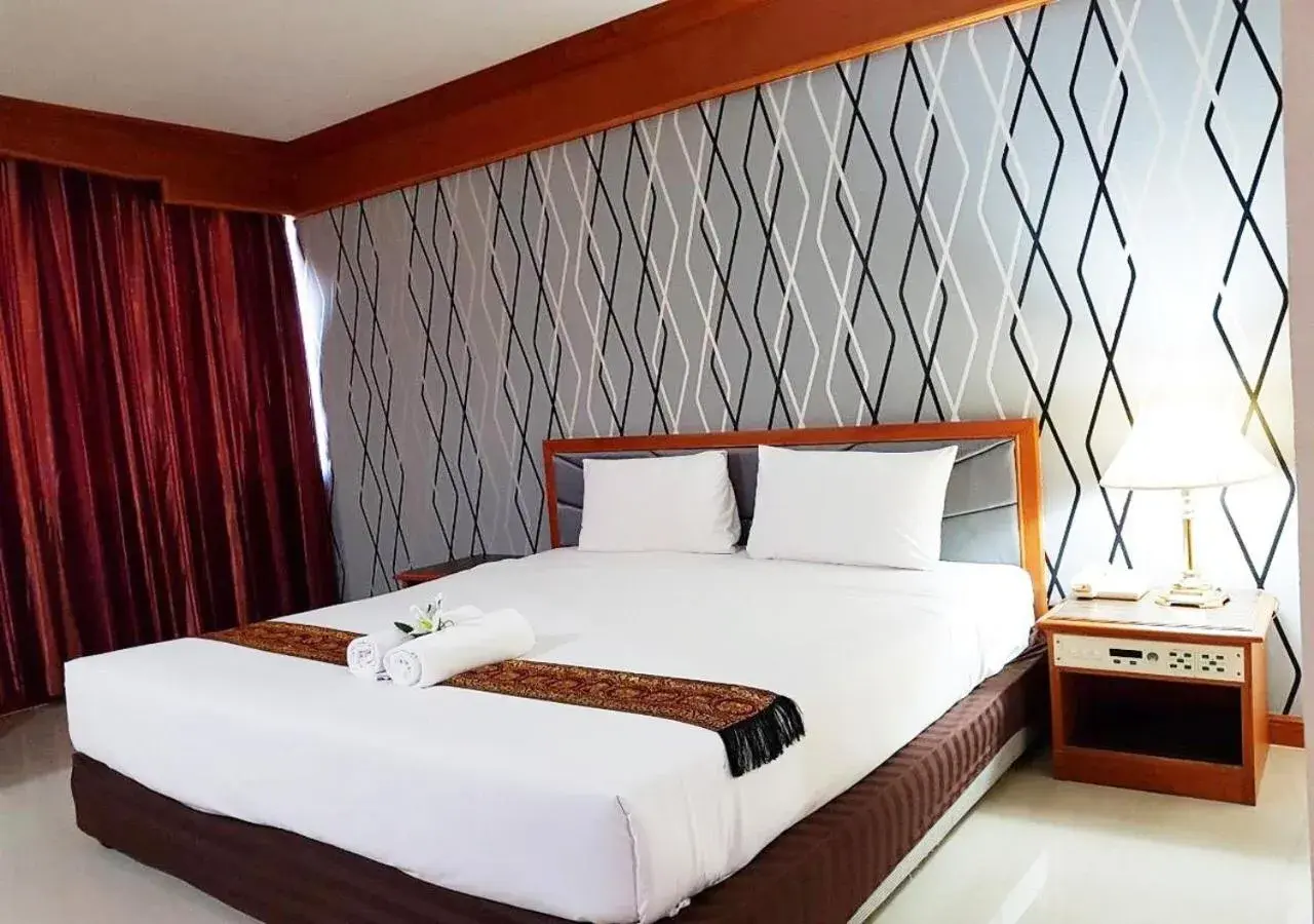 Bed in JP Emerald Hotel Bed in JP Emerald Hotel