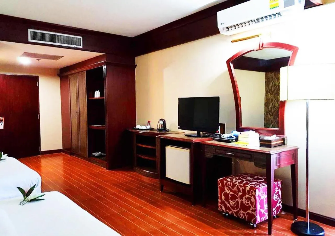 Bed in JP Emerald Hotel