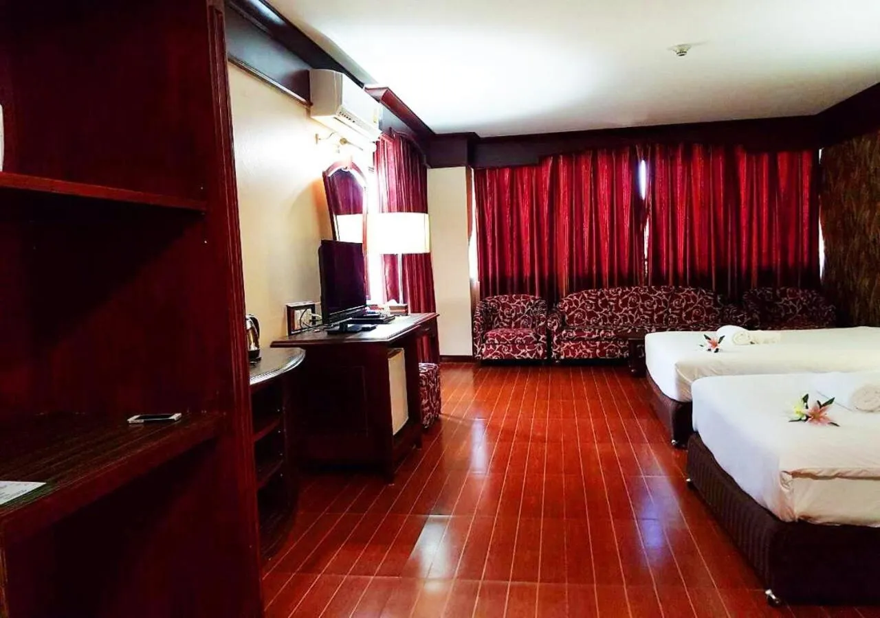 Bed in JP Emerald Hotel