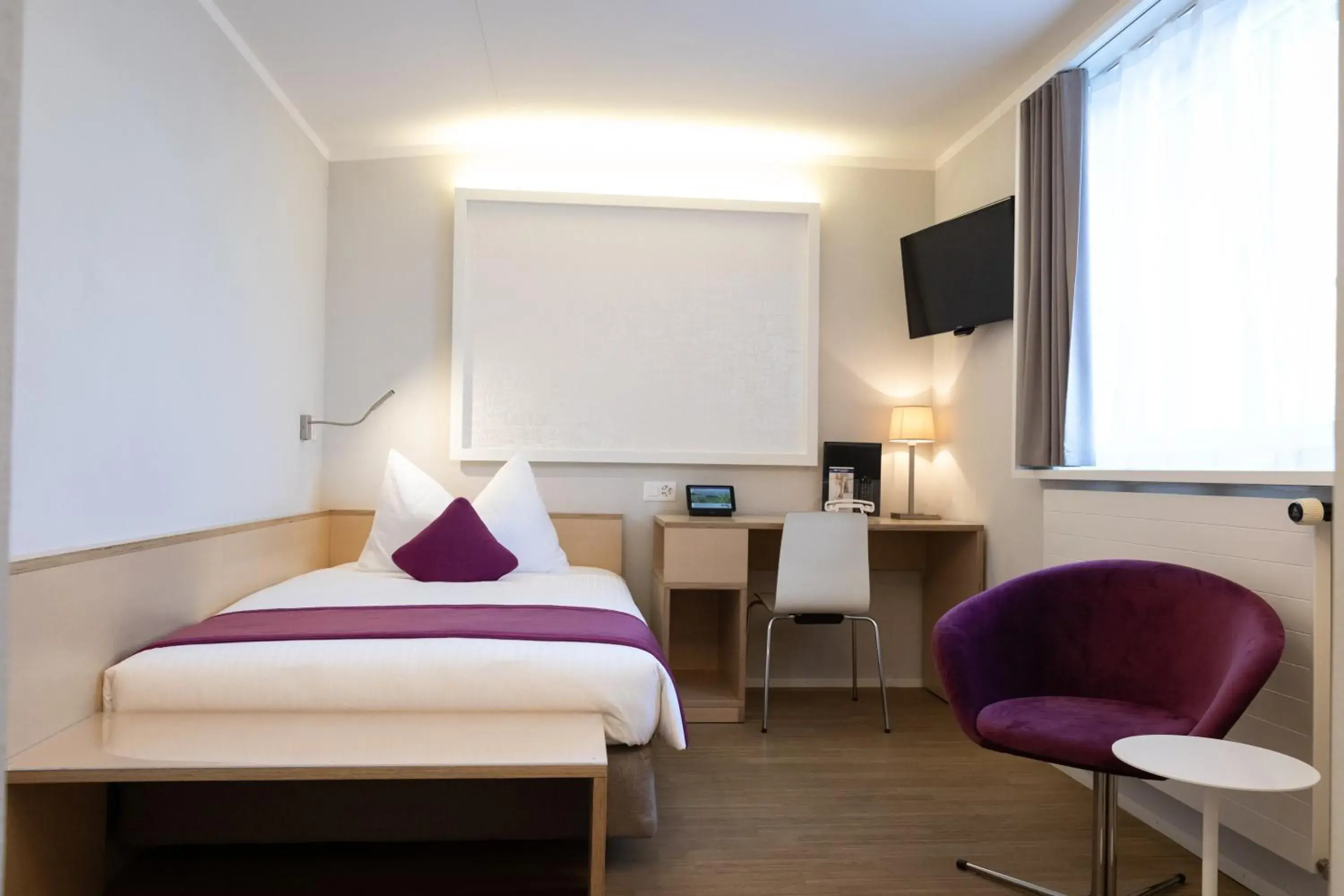 Bed in Hotel Spirgarten Bed in Hotel Spirgarten