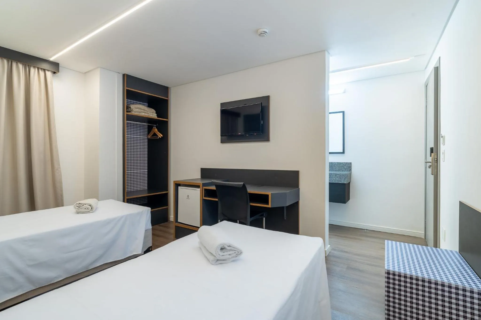 Bed in Uniclass Hotel Lapa