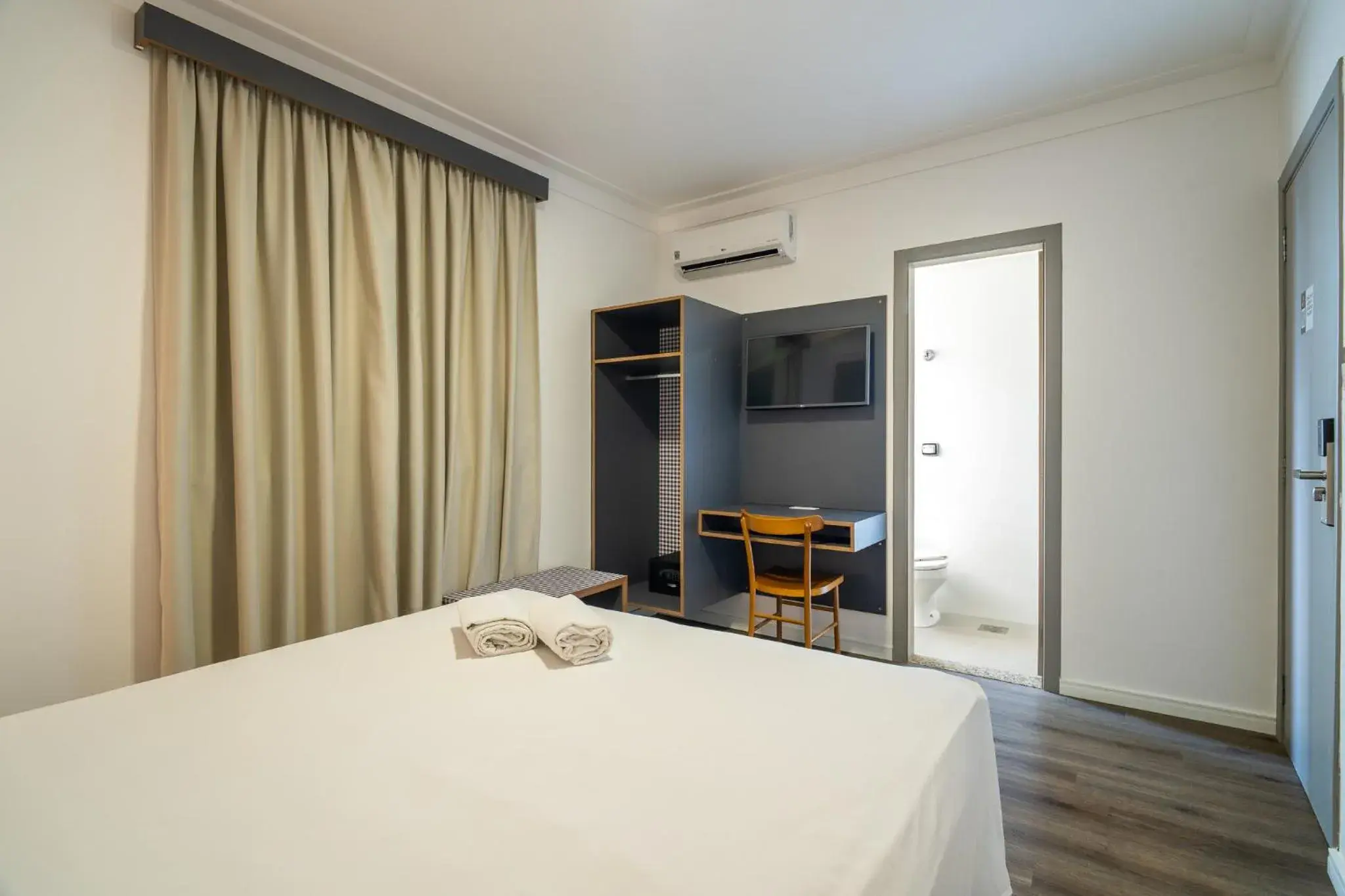 Bed in Uniclass Hotel Lapa Bed in Uniclass Hotel Lapa