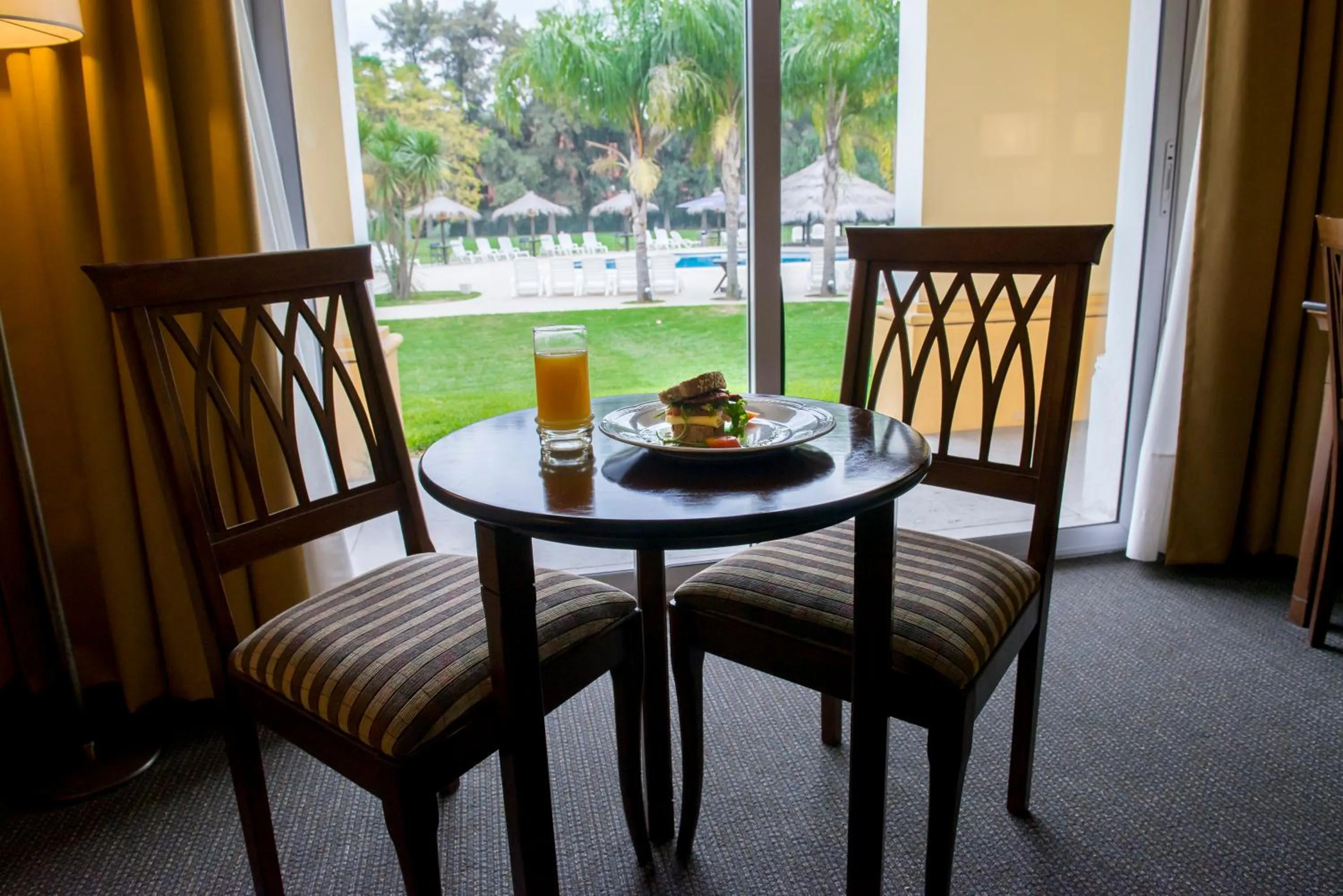 Bed in Howard Johnson Pilar Resort Spa & Convention Center