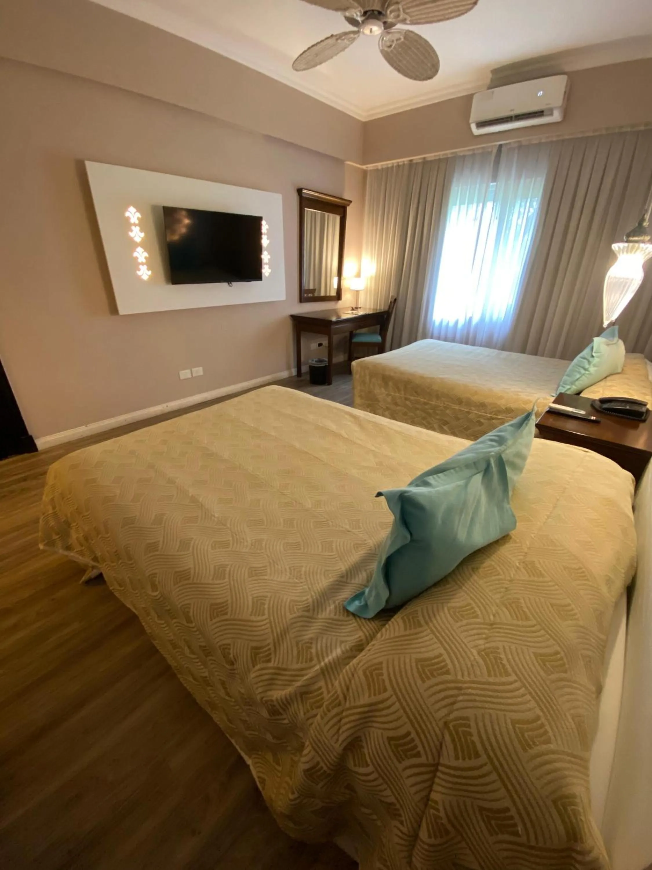 Bed in Howard Johnson Pilar Resort Spa & Convention Center