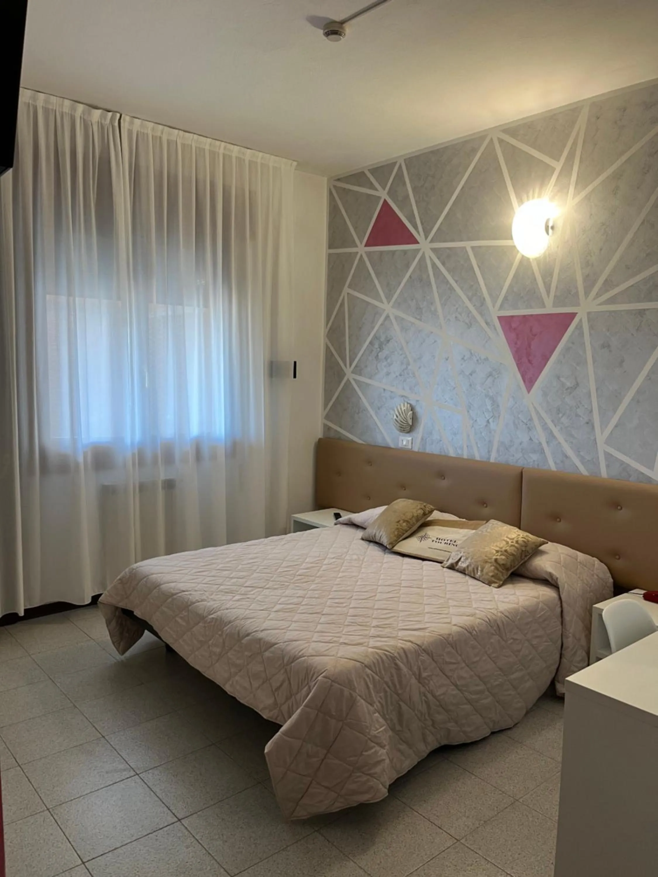 Bed in Hotel Touring