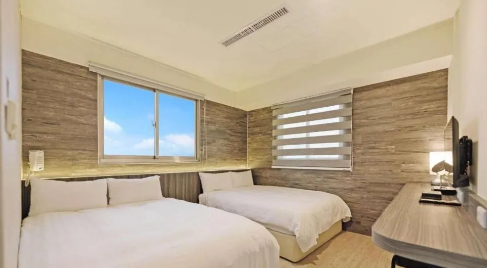 Photo of the whole room, Bed in Huaxin Hotel