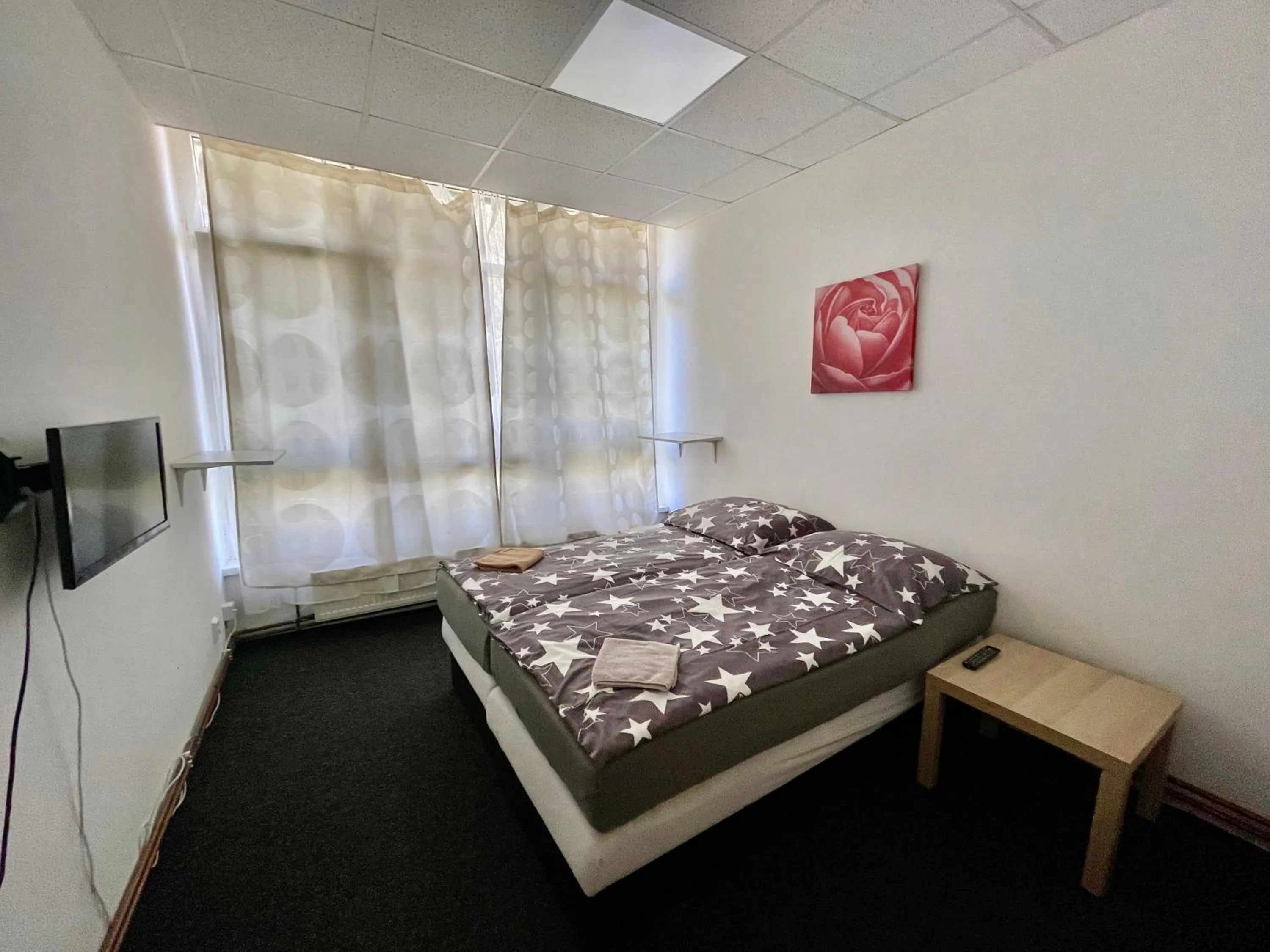 Bed in Apartmany Fit Gym