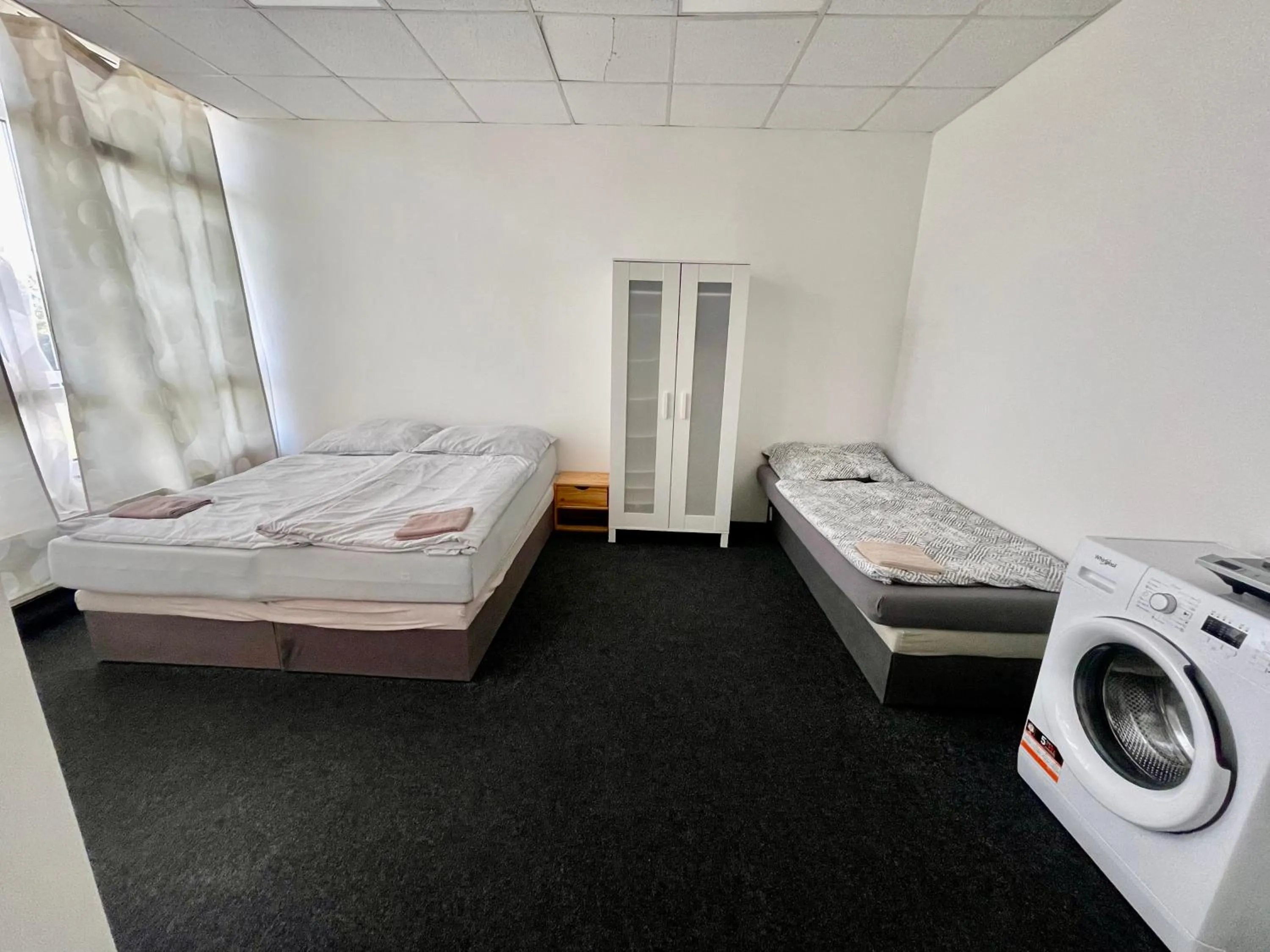 Bed in Apartmany Fit Gym