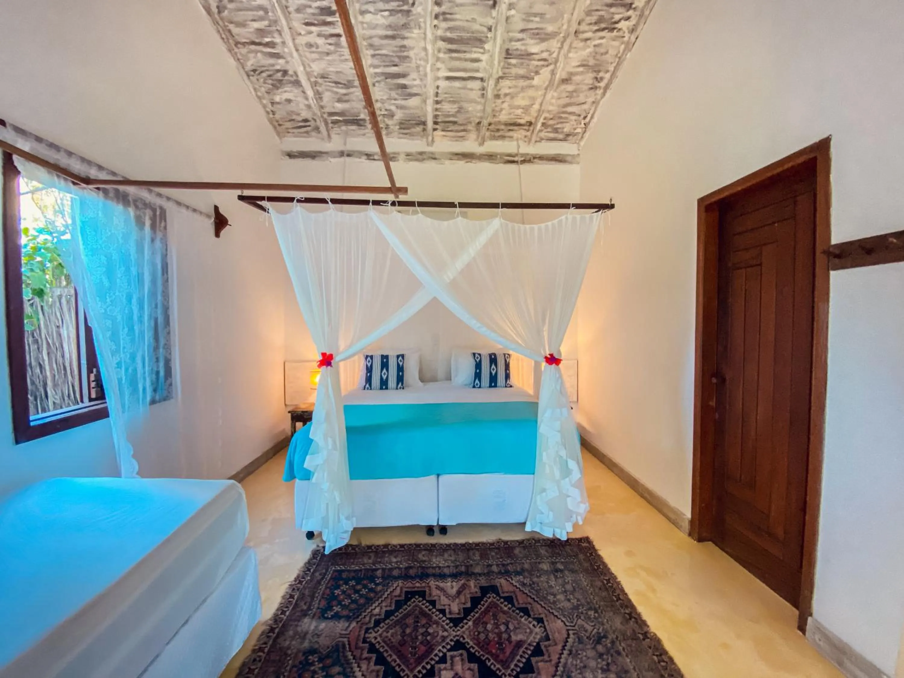 Bed in Pousada San Antonio Praia